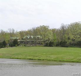 One-Of-A-Kind 136.56 Acre Missouri Wine Country Farm With Unique Log Home!

Breathtaking Southern Appalachian Mountains white pine hand-hewn log home.  Custom designed by the owners, no detail of this stunning 6,500 sq. ft. home was overlooked.  Soaring 28' high ceilings & Rumford stone fireplace draw your eyes upward to the second level with wrap-around balcony.  Interior wood features are from timber from the Mark Twain Forest.  Beautiful floors are 125 year-old recycled wood from the East St. Louis Stockyards.  Truly a chef's kitchen with 2 of several appliances!  Candle-lit formal dining room & the "Back Porch", both of which have a wall of windows.  Second story offers 5 master bedrooms & baths, with 5 bedrooms having FP or wood stove.  Wrap around porch.  Connected to the main home is a 2-story log 'bunk house'.  Acreage is a nice mix of woods & fields.  Stocked lake & pond.  Second Creek runs thru property.  Barn has stalls & tack room.  Numerous horse & ATV trails.