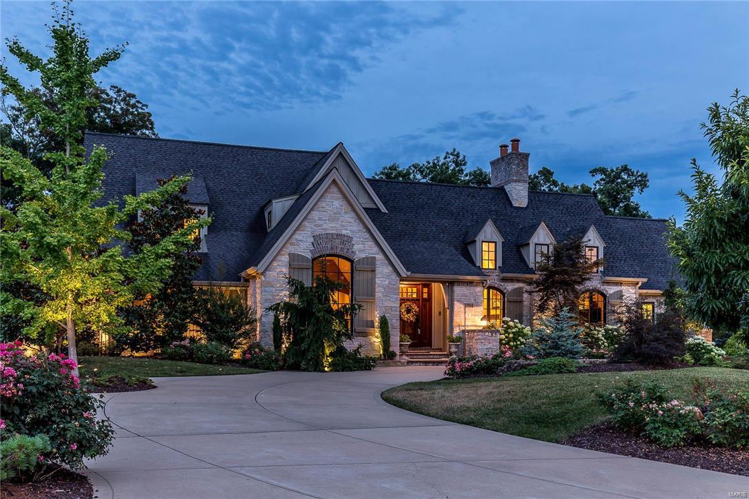 From the moment you pull into the circular drive, you realize there may be no finer home to grace Sunset Hills.  Thoughtfully positioned on a masterfully landscaped acre, this sprawling custom home evokes feelings of timeless grandeur. Once inside, you will be hard pressed to find a more engaging environment.  Enjoyment is felt in every part of this home as the inside melts effortlessly into the surrounding landscape with its hand-hewn hickory and limestone flooring, stonework, hammered iron, and sun-drenched rooms.  Natural colors and visual textures combined with the well appointed floor plan creates a calm sense of retreat throughout.  Whether your lifestyle demands exquisite elegance; rich multigenerational living, or an unparalleled family retreat; you have arrived. Additional Rooms: Mud Room