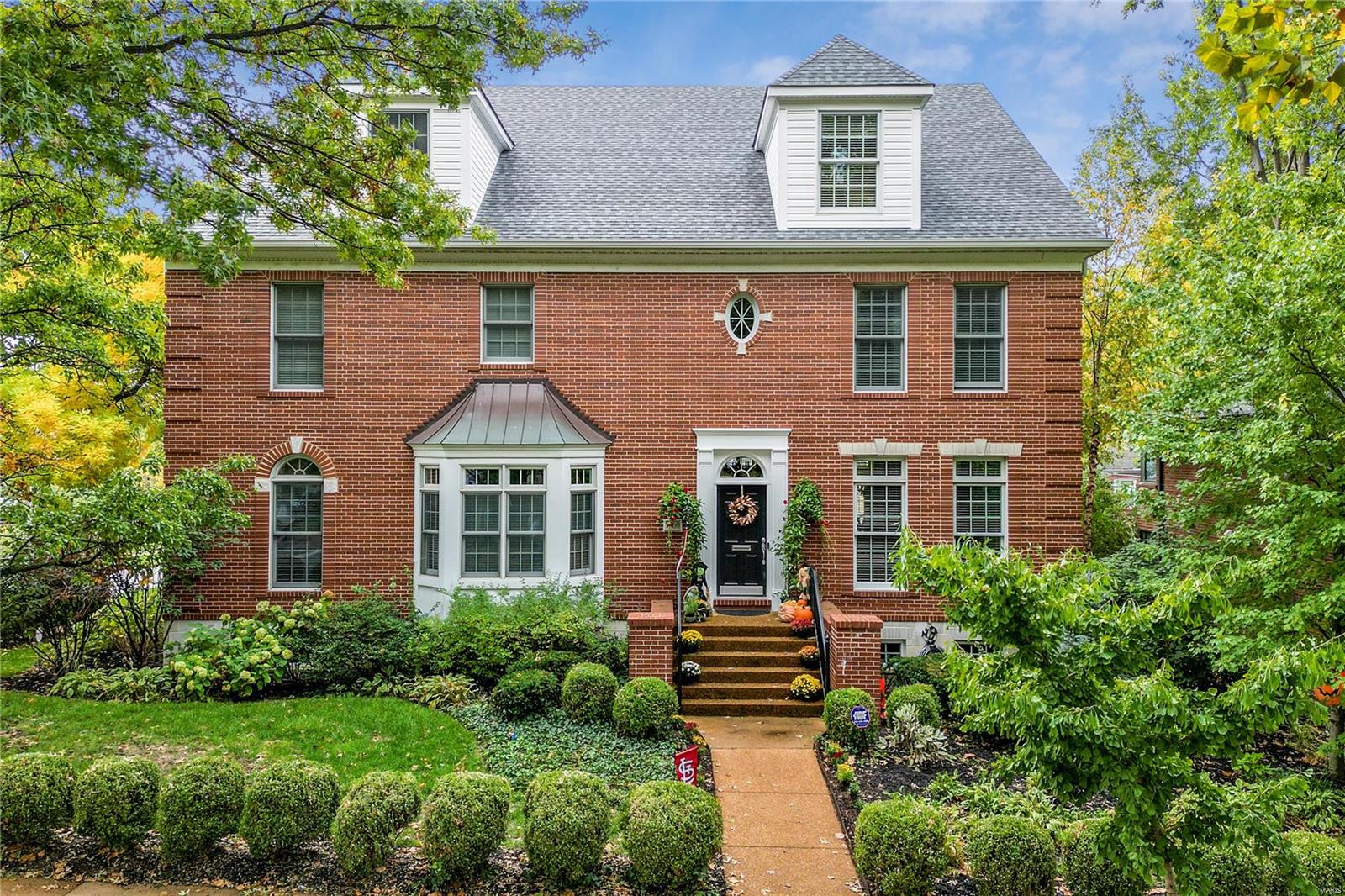 Incredible NEW PRICE! Welcome Home to this Fresh & Stylish Georgian-style townhome in Vibrant Clayton. Main floor boasts 10ft ceilings, sleek hardwood floors & an exceptional floor plan with premium finishes throughout. Spacious Living Rm & Dining Rm are ideal for entertaining. Gourmet eat-in Kitchen boasts custom cabinetry, granite countertops & Top of the Line appliances. Charming family rm feat. gas fireplace & opens to private deck. Second floor offers 9 ft ceilings, Private Owners Suite w/ large walk-in closet & updated spa like bth with double sinks, marble floors & sep. shower & tub, 2 add. bedrooms with j&j bathroom and laundry. Third floor provides incredible BONUS suite with full bth. You will love the finished lower level family rec rm, generous storage & 2-car tuck-under garage. Blue Ribbon Glenridge Elementary across the street, easy access to beautiful and peaceful tree-lined Wydown Blvd & numerous parks. All that Clayton has to offer, move-in ready, easy upscale living! Location: End Unit
