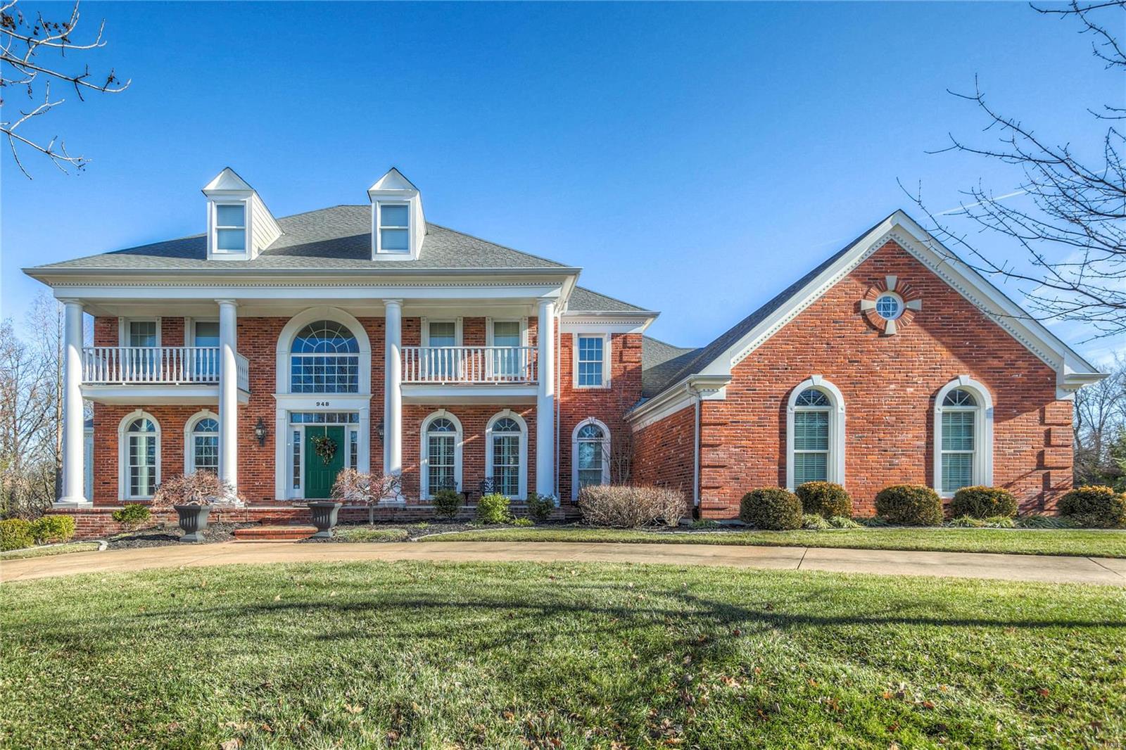Remarkable in every way!!! This beautiful 1.5 story is being offered for the 1st time by the original owners who have updated every corner to perfection. Approx 5400 sq ft on first 2 floors with another 2000 in LL, this home is loaded with special features to include: 2 story entry with grand curved staircase, formal office with pocket doors/beamed ceiling, large dining room, 2 story GR with fireplace/walk behind bar, Gorgeous custom kitchen with newer cabinets/counters/stainless appliances/Vaulted beamed with wood inset ceilings in hearth & breakfast room. Glamours master suite with super large custom closet/updated bath/heated floors. 3 bedrooms upstairs and 2 full baths. The LL is like no other with 10 foot pour, large family room with fireplace/custom bar area, media room, billiard room, office, exercise, sauna, bedroom, full bath. WO to level rear yard with L shaped pool and outdoor cooking area. Large screened porch opens to upgraded deck. Large over sized garage.