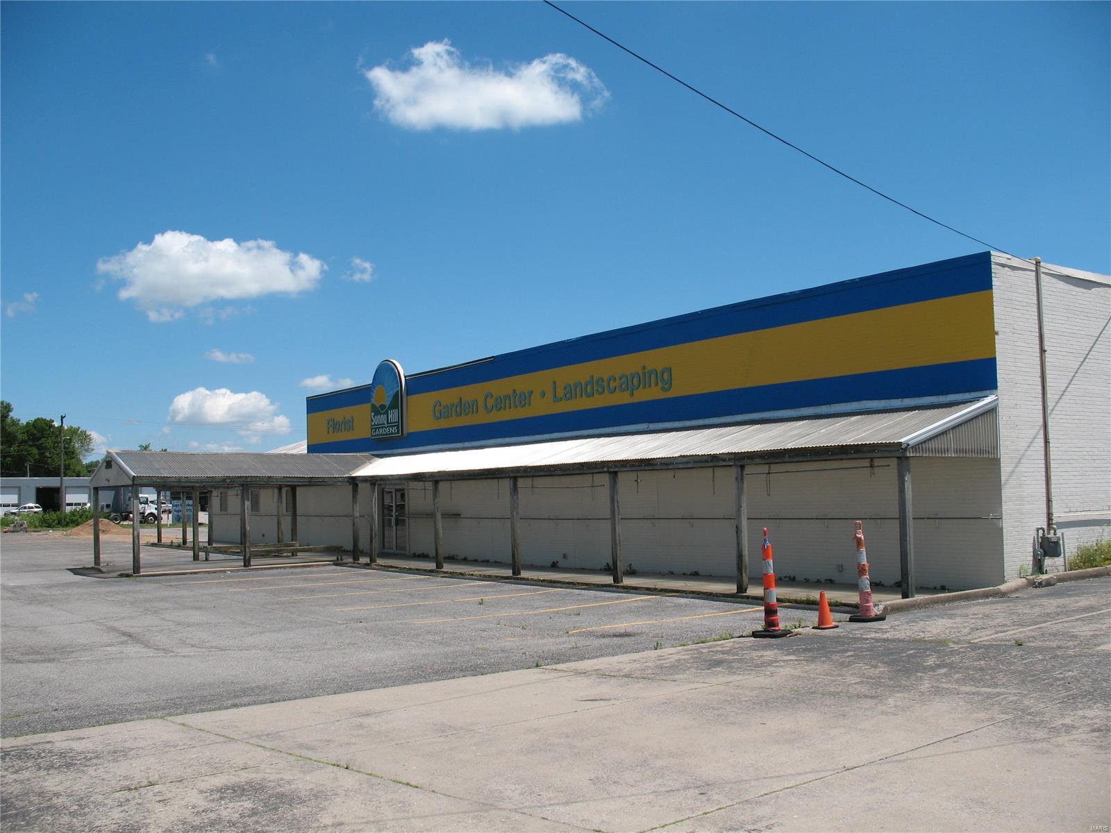 Located in one of Cape's highest traffic & visibility locations. Suitable for various uses, including redevelopment, is this 11,527 SF building with showroom, offices, and warehouse area.  Excellent off-street paved parking and good signage. Access from Kingshighway and Bessie Streets.  1.49 acres with room to expand the current building. Location: City, High Traffic