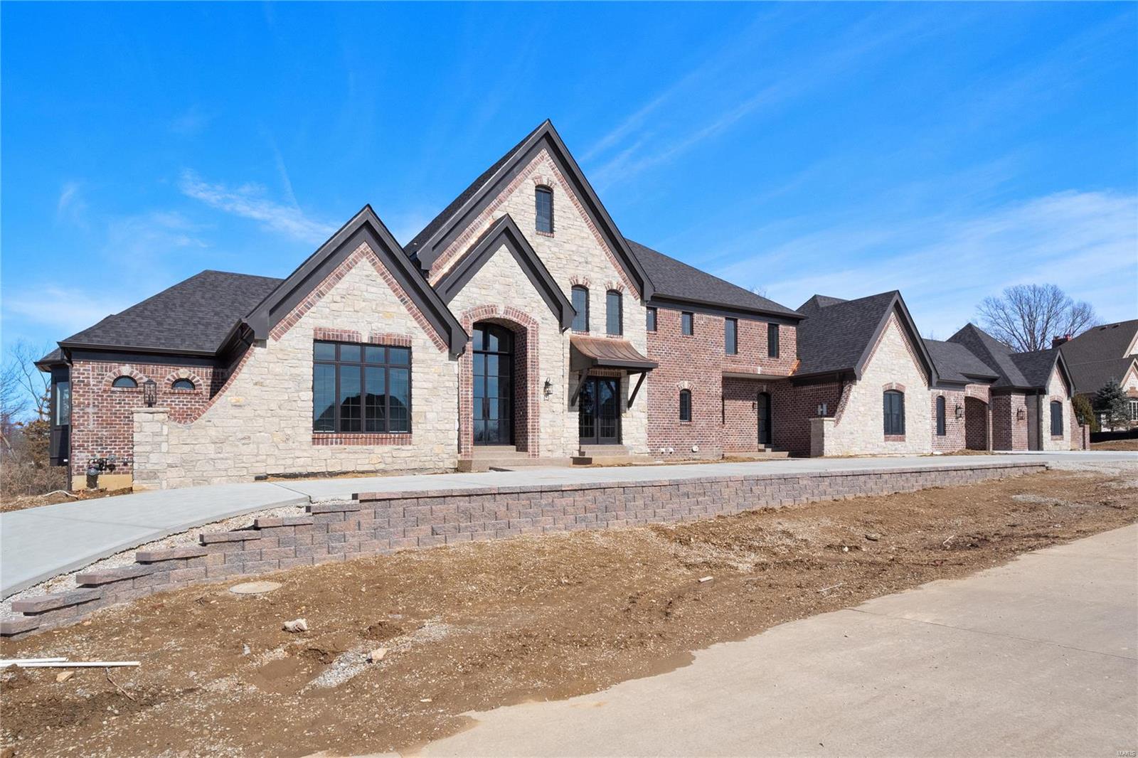 Wildwood, Rockwood Schools! Luxury new construction in Lafayette Crossing! 1.5 story model offers approx 4,500 sqft of finished living space at main & upper level, approx 1,800 sqft additional finish at LL featuring wet bar, media room, rec room & fitness room. Rich stone/brick elevations to choose from. Upgraded features include: 4 car garage, 10' foundation pour, 10' first floor ceilings, exquisite finishes, exceptional craftsmanship & custom millwork throughout. Features 5 beds, 7 baths (5 full, 3 half). Gourmet kitchen w/ center island, top-of-the-line SS appliances & custom cabs. 2 story hearth room has see-thru gas fireplace & built-in bookcases. Master suite: coiffured ceiling, bay window & luxury bath. Lot is perfect for a pool! Other features: highly sought-out area that's walking distance to multiple schools, shopping, restaurants & MORE! Photos shown are meant to reflect the builder's quality & are not necessarily of the home to be built *Duplicate Listing of MLS # 20023738*