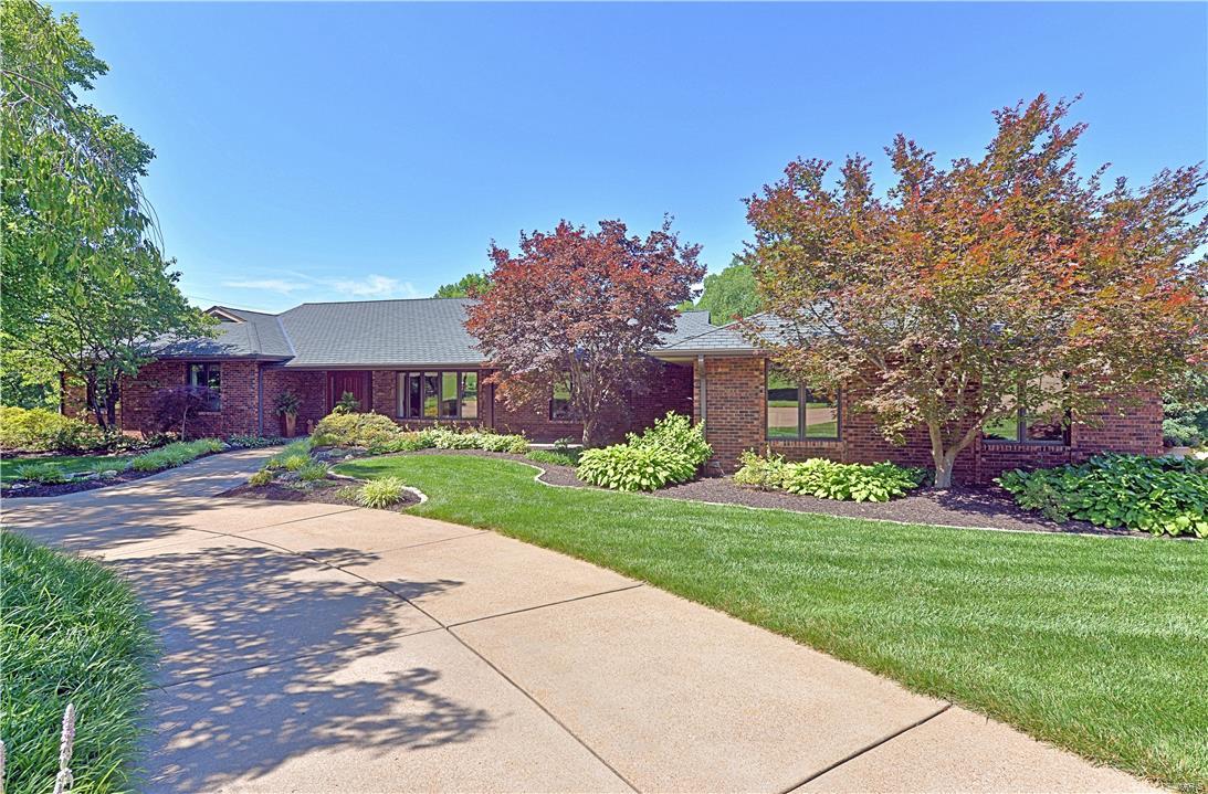 Spectacular Ranch on 6 acre estate surrounded by neighboring estates. Elegant finishes with a hint of rustic flair. Newer Kitchen/w   glass insert cabinet doors, Wolf appliances, SubZero refrigerator & separate SubZero Freezer. 10'X3'6" Granite work island. Travertine floor in Kitchen. Breakfast room & Sun Room with stain glass windows over looking expansive stone patio. Covered stone surface patio located off Kitchen. Recently renovated Master Bath. A passion for landscaping is obvious expanding over the 6 acres of mature trees, manicured planting beds & flowered areas. Oversized 2 car garage with concrete parking area for the entire family plus a circular driveway area. Basement is partially finished with  huge bedroom, family room, overwhelming amount of storage & work bench area & a stairway to the garage. Part of the property is fenced for the owners horse and structure. Decorative Rocks, Stones and boulders located on the property do not stay and will b e moved by the sellers. Additional Rooms: Mud Room, Sun Room