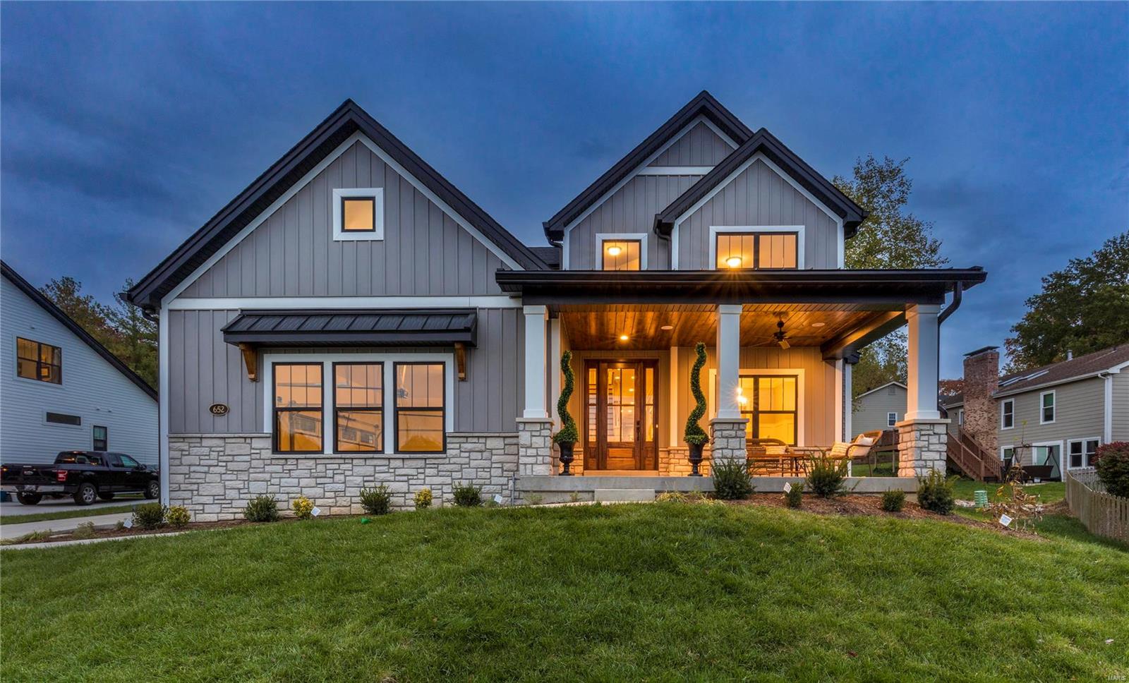 STUNNING view from this almost-unheard-of-front-porch, perched over your HEATED DRIVEWAY, overlooks the valley. But don’t think for a moment that the rest of the home isn’t vying for your attention. Entering the 8 ’ MAHOGANY front door, the abundance of NATURAL LIGHT highlights the luxurious features within; COFFERED ceiling, stylish WOOD FLOORS, well-crafted millwork, CUSTOM Kitchen. Gathering spaces and bedrooms adorn each level of the property. The primary suite on the main level includes one of the most generously sized walk-in closets around. The 2nd floor connects 3 bedrooms to a huge bonus room, and the lower level provides 2 additional sleeping spaces/offices just past the Rec Area. MAIN AND 2ND FLOOR LAUNDRY, built-in speakers inside and out. And location? Couldn't be better. After playing on the 2/3 acre lot, if looking for something else to do, you can always walk to West County Mall to return those holiday gifts that just don’t work out! When should we look for you? Additional Rooms: Mud Room