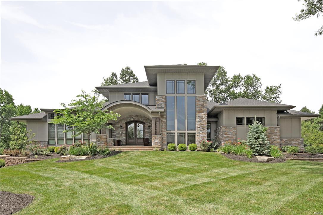 Timeless design unites with sustainable features to create extraordinary luxury living in this 5,000+ square foot Creve Coeur residence. Enter the light filled Great Room with clerestory windows, white oak wood floors, shutters and french doors. A cook's dream kitchen complete with multiple prep areas, professional grade appliances, quartz and iron ore counter tops and wet bar awaits you. The Master Suite boasts the ultimate spa experience that will become your favorite retreat. Completed in 2013 and located w/in the Ladue School District, the homeowner recently added a Baker Saltwater pool, spa, outdoor living area and outdoor kitchen and a finished lower level adding an additional 2,700 square feet of refined finishes including media room, climate controlled wine cellar, full service bar and guest suite with ensuite bath and steam shower.The residence skillfully integrates indoor/outdoor entertaining w/ all the comforts of every day living. Beautiful! This is a Certified Green Home. Additional Rooms: Mud Room COOL: 14 SEER+