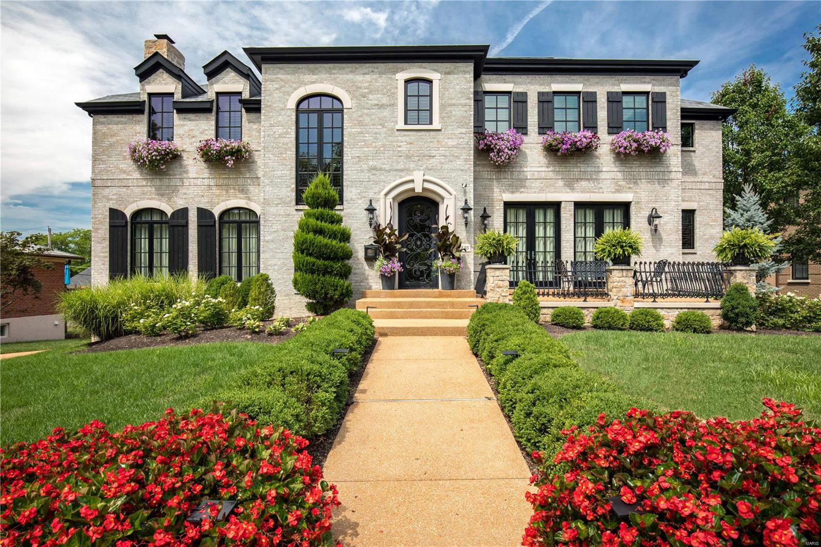 Sophisticated living blends with European countryside ambiance, only steps away from Clayton’s fine amenities.  This recently designed custom home with it’s one of a kind finishes would be an opportunity anywhere but most especially in this prime and exclusive community. For those looking to scale up or right size, the stone details and beamed accents are authentic compliments to the select natural appointments that are integral to the home. 6623 sq ft of living space!  Magnificent greatroom, superb kitchen with artisan details and , sumptuous master suite and a warm,  casual yet impressive finished walkout lower level. 4 bedrooms, 3 full 3 ½ baths, elevator, wine cellar,4 has fireplaces,  2 car rear entry garage. Level lot & property designed and landscaped  by Poynter. Expansive outdoor terrace & deck for entertaining. You will not have to sacrifice any of your wish list, this Mid town masterpiece has it all!