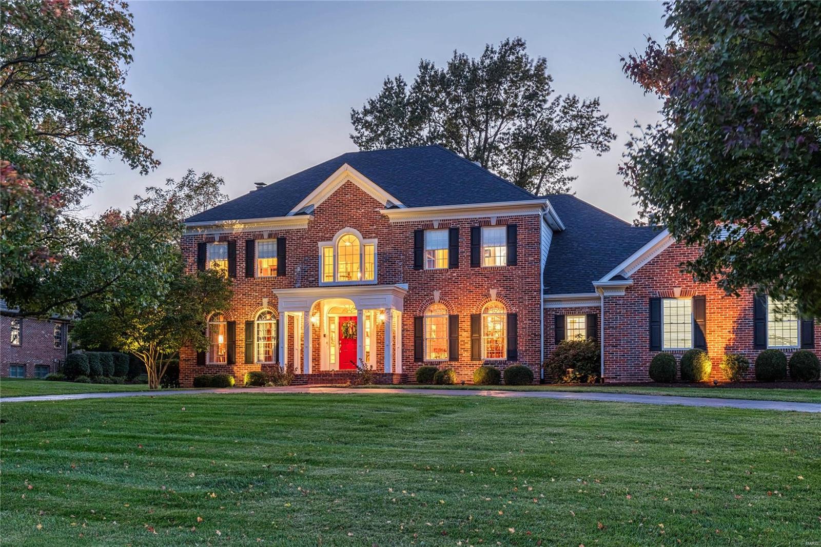 Located on sought after Oak Springs Lane, this gorgeous home is meant for making lasting memories! A bright, 2 story entry foyer, opens to a beautiful burlwood library left of the front door. To the right, imagine an elegant feast in the spacious dining room lit up with a crystal chandelier & brightened w/wainscoting.  Straight ahead, the enormous great room is meant for entertaining, as it offers a w/b fireplace flanked with bookcases & wet bar for conversation & cocktails. Large Palladian windows enhance the space, overlooking the well landscaped yard & stunning pool. Create your favorite meal in the bright white chef's kitchen w/large island, breakfast area, & well-appointed, built in desk. The kitchen opens to a cozy family room, also overlooking the lovely acre lot, w/patio access, walls of windows, cabinetry & vaulted ceiling. Complete the day, with a luxurious retreat to the Master Bedroom suite - or any one of the other 3 ensuite bedrooms w/baths. Welcome home!