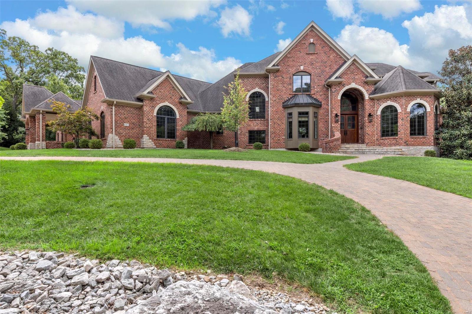 WOW!! GORGEOUS 1.5 Story, 6 Bedroom 8 Bath Full Brick home in highly sought after Chesterfield/Clarkson Valley/Rockwood School District! 
Private 2-acre lot on Cul-De-Sac. Built by Bozich Luxury Custom Homes. Almost 9,000 Square feet of luxury living!
  
HUGE Chef's Kitchen! Wolf 6 Burner Stove w/Griddle, Double Convection Oven & Pot Filler! Commercial grade Vent. Hidden Side Spice Drawers! 
Sub-Zero Built-in Fridge. Warming Drawer! Walk-In Butler's Pantry! TWO Laundry Rooms!  Main level Wet Bar has Wine Fridge! Lower-level Bar has Wine Fridge, Dishwasher & Ice Maker!
*Master Suite has TWO Floor to Ceiling Walk-In Closets!
All 4 OVERSIZED 2nd level BR'S have Ensuite private bath & Walk-In Closets!  
*12 Ft, Vaulted & 10 Foot Ceilings on Main Level!  9 Ft+ Ceilings in LL & 2nd Floor! 
*PERFECT yard for pool! Seller has provided Professional drawings for future pool or Infinity Pool ideas!
 3 Private lakes in the neighborhood for Fishing, Kayaking, Paddle boarding! Additional Rooms: Mud Room