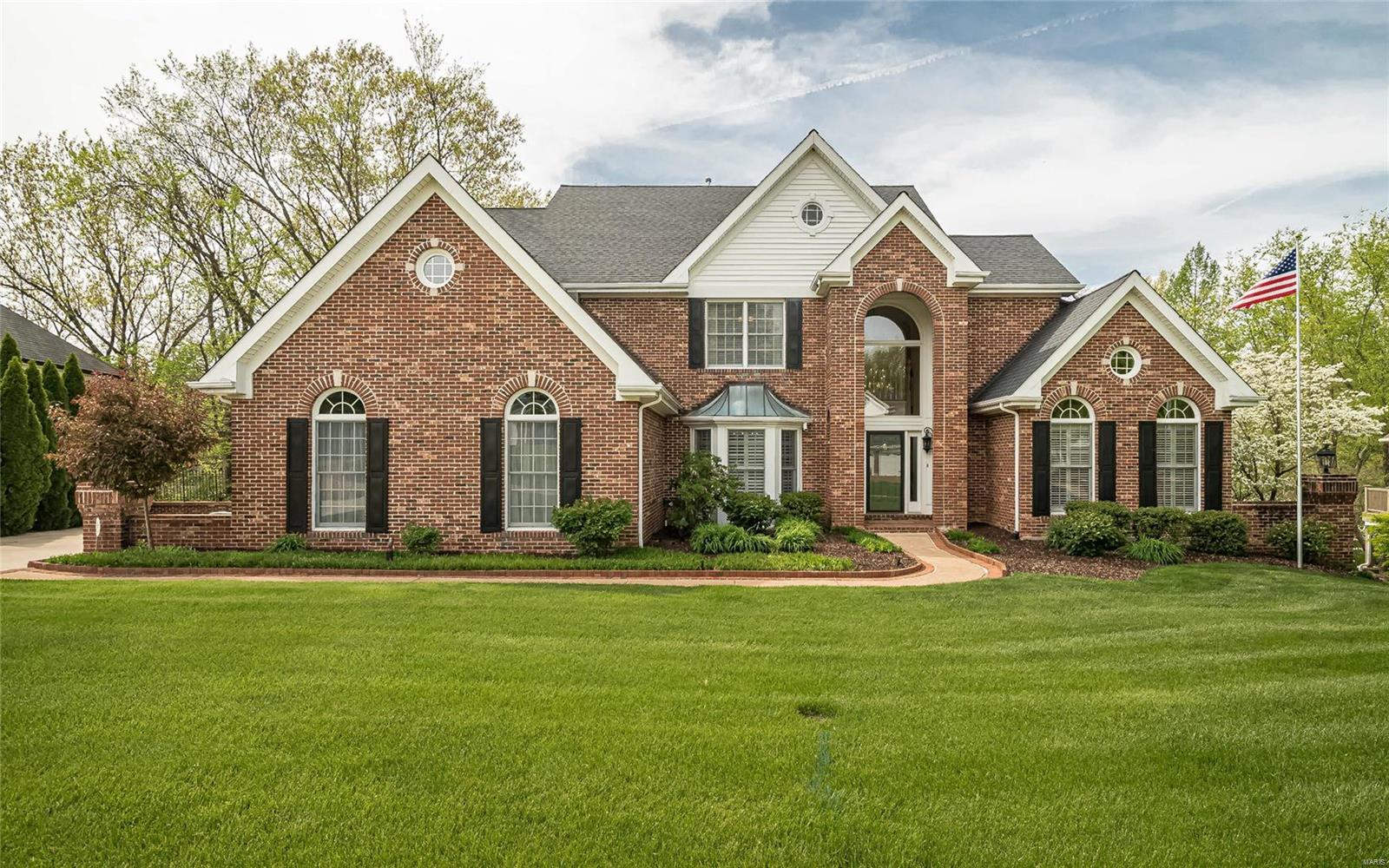 Balancing traditional with modern updates, this 1.5 sty 5BR, 4F,2H bath home has over 5200 sq. ft of beautiful spaces with incredible levels of finishes. Entering the foyer you feel like you are in a tree house with views out the Great Room that walks out to wonderful deck and gazebo. Formal DR with trey ceiling and a perfect study with a wall of bookcases flow to the master bedroom suite with his/her closets and updated bath. Bright white kitchen with center island and stainless appliances adjoin the breakfast/hearth room with door to deck. Upstairs are 3 large bedrooms with huge closets, two share Jack & Jill bath and one en suite. Downstairs is every family's dream space with 9'ceilings, fitness room, media area, family room with built in bar and gas fireplace, full bath, 5th bedroom and full walk out to covered stone patio overlooking private woods. Awesome laundry room with 1/2 bath, 3 car garage, central vac, in-ground sprinkler and access to WW swim/tennis club. This has it all.