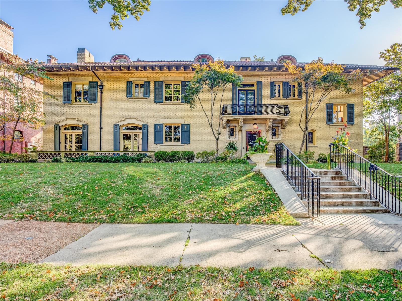 This 1914 Mediterranean Revival-Style designed by Russell & Crowell Mauran sits behind the historic stone gates of Kingsbury Place, a prestigious address in the Central West End. This remarkable home combines the best of Old World elegance with today's desired amenities creating the perfect setting for entertaining. Meticulously updated, this gorgeous home boasts outstanding architectural elements, including a marble-floored entry, leaded glass windows intricately carved and newly painted fireplace mantel in the formal dining room, built-in bookcases, refurbished artistic stenciling on living room ceiling beams, gleaming hardwood and tile floors, and elegant plasterwork. Updated chef’s kitchen and butler’s pantry includes custom cabinetry, granite countertops, separate Subzero refrigerator and freezer, which was also updated to stainless doors, Viking cooktops and double ovens, and a warming drawer. Welcome to Kingsbury Place. Welcome to your new home.