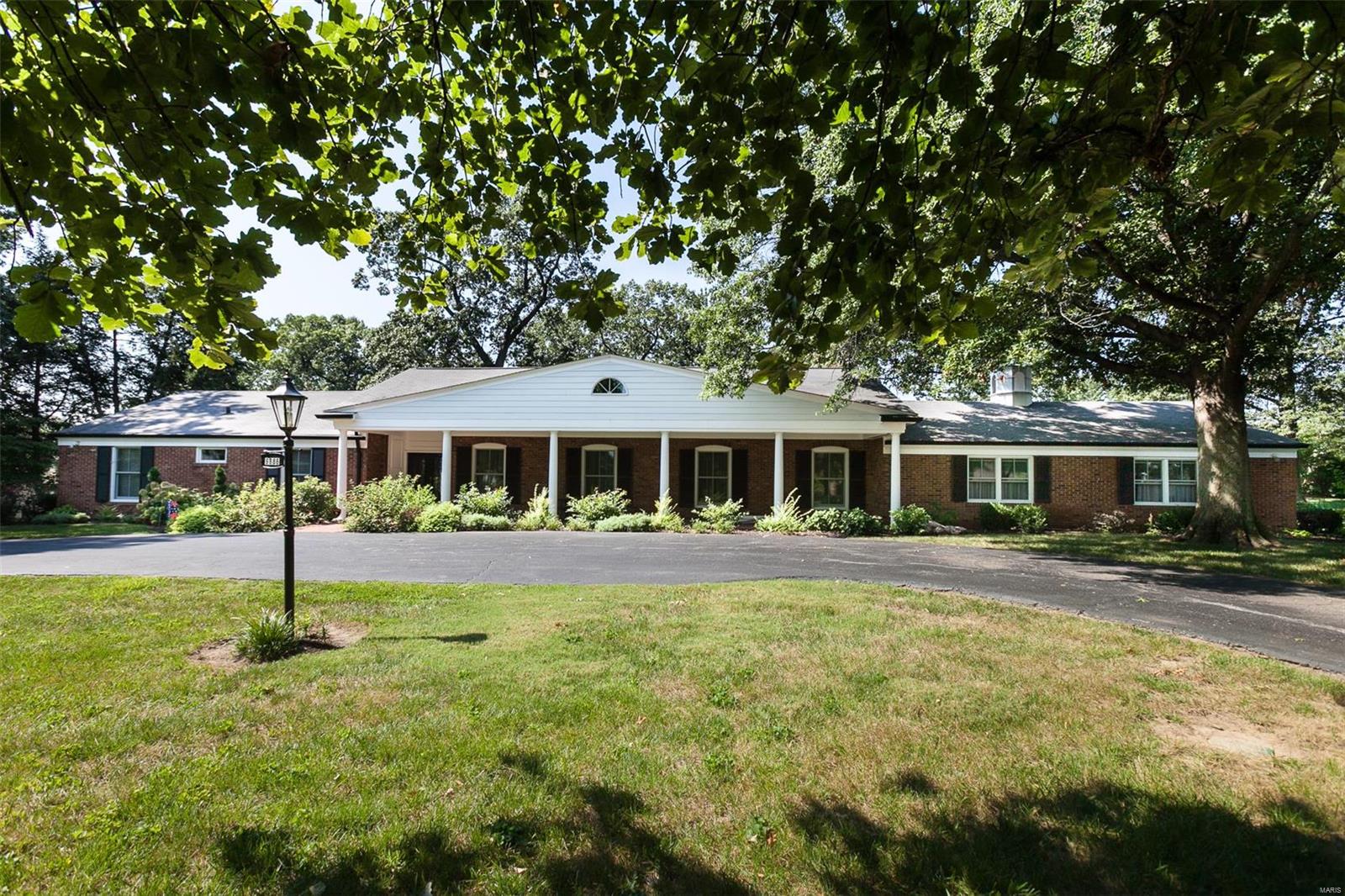 Impeccably maintained and updated ranch on a 1.8 acre lot across from Old Warson C.C.! Quality and rich detail throughout with beautiful moldings, 9 foot ceilings in foyer, office, dining room, and family room! Entry foyer is generous, spacious open floor plan in the living areas of kitchen and family room. Family room has window seats flanking the huge fireplace, also wainscoting and beautiful mantel. Formal dining room is ready for a large family gathering and has windows to view front covered brick terrace. Sliding doors from breakfast room and family room to picturesque backyard and brick patio. Newly finished lower level adding 1,000+ sqft. Updated zoned HVAC, alarm system and new sprinkler system. All baths and kitchen gutted and remodeled. Laundry room is next to kitchen and 4th bdrm is great for guests. Master bedroom has walk-in closets. 3-car heated, rear entry, oversize garage. Circle driveway in front with separate drive in back with plenty of parking for large gatherings. Additional Rooms: Mud Room