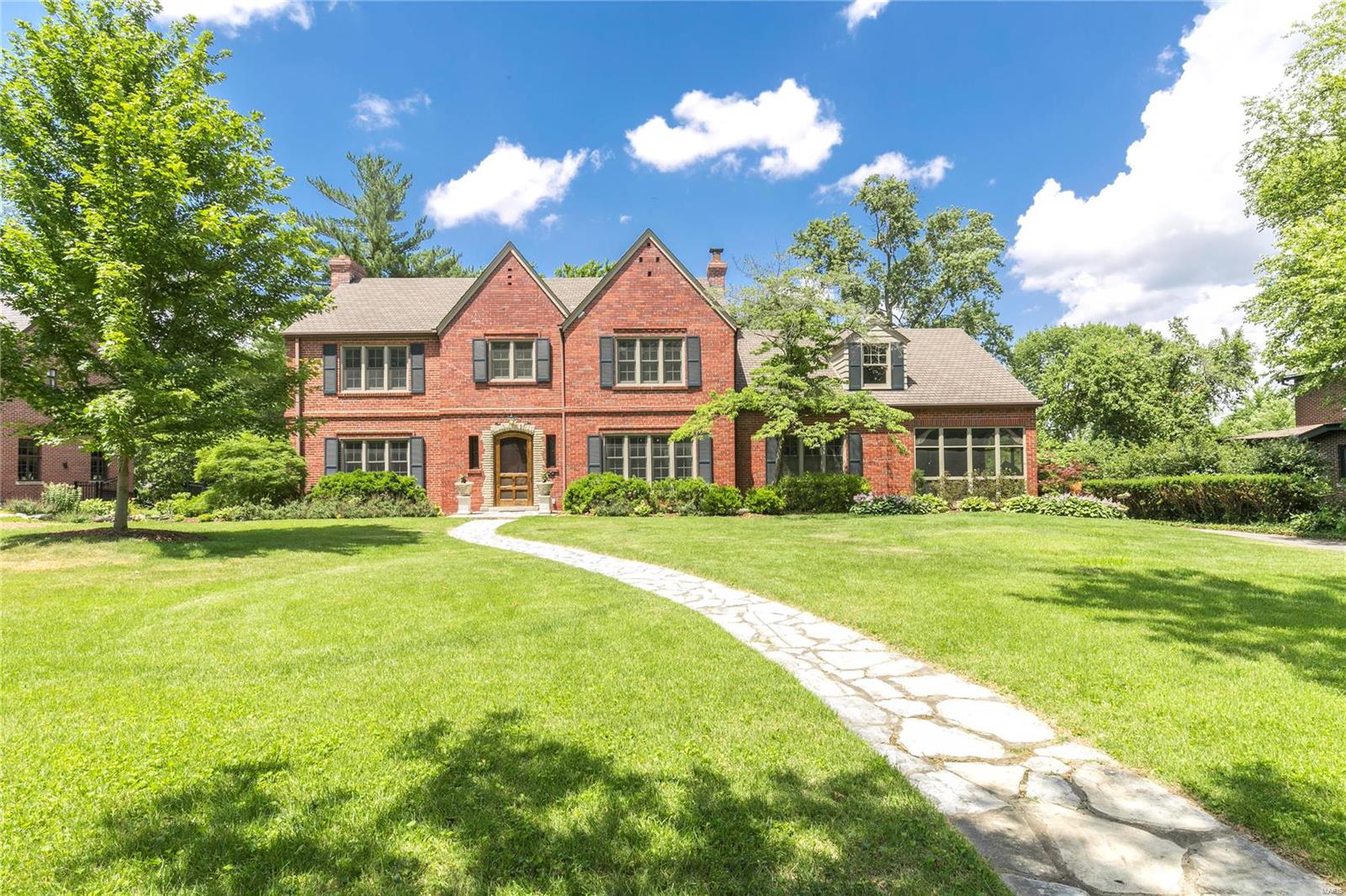 Look no further, your dream is reality. Not often does a home of this stature & presence become available in a neighborhood w/such prestige. Location is paramount & lifestyle is unmatched. One of the most distinguished streets in St. Louis within walking distance to Downtown Clayton where you'll enjoy fine dining, boutique shopping. Walk to Flynn Park, play tennis, enjoy coffee at Cursed Coffee or tacos at Taco Budda. All within your reach. Live where you play & love where you live. Picturesque setting enfolds this classic 4 bed/4bath home perfect for entertaining. Designed in 1940 by acclaimed Winkler & Grueninger architects, epitome of Classic Colonial Revival. Light filled rooms, charming screened in porch, private patio. Massive yard, allow your imagination take control. All updates have been completed for you. Master Suite w/custom walk-in closet, finished lower level w/pool table~added living space. Separate living quarters perfect for in-laws or au pair. 3 car attached garage. Additional Rooms: Sun Room
