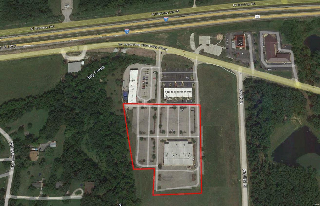 25,500 sq ft  engineered building located in OPPORTUNITY ZONE.  I-70 Visibility and easy access via major connector.  Opportunity Zone Tax Credits apply here.  Zoning permits Foodservice, Indoor Storage, Industrial, Commercial Office, Professional Office, Retail, Commercial Parking, RV, Hotel/Motel,, Indoor Entertainment, Schools, Church or Religious Assembly, Medical, Dental, X-Ray, Out-Patient, Library, Museum, Art Gallery, etc. Excellent Location fronting Interstate 70.  All utilities present included 3-phase electric.  Sprinklered and alarmed with multi-zone HVAC throughout and ~ 240 asphalt paved parking spaces.  4.48 acres included and adjoining property is also available. SpecialListingConditions: Short Sale Location: City, Hwy/Interstate Frntg