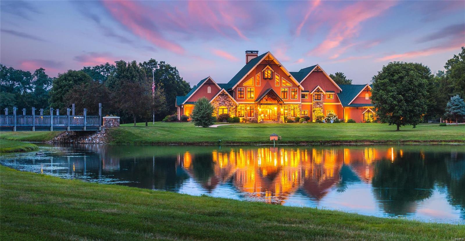 Tastefully designed country estate situated on 17.35 acres within 45 min of St. Louis. This craftsman style home offers nearly 11,000 sq ft of custom details that are not often found. Features include: fascinating entry into the main living area w/ full stone fireplace and expansive windows - large master suite w/ vaulted & turret ceiling, onyx walk in shower, and custom closets (w/mini fridge), 2 main kitchens, butler's pantry, and outdoor kitchen (all w/ solid surface counters), 6 bedrooms/8 bathrooms, executive style offices, custom woodwork, all closets custom designed by NewSpace, 2021 Sonos system installed inside and out, full bar in lower level, projector screen for movie night, safe room. The lower level walks out to the in-ground pool, covered patio with outdoor kitchen, stone fire pit with pizza oven. The main floor walks out to an ipe (brazilian walnut) deck that overlooks the pool. The 3 car garage is heated w/ dog wash area. This entire home is backed by a generator.