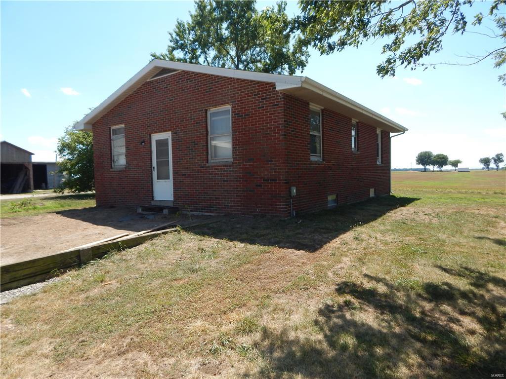 114 ac mostly tillable with small home and farmstead.