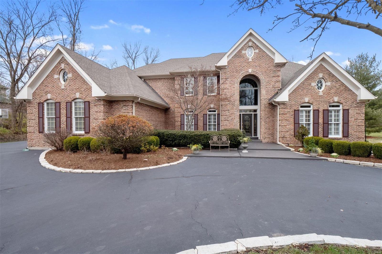 This newer home on a private cul-de-sac represents a fantastic value! A marble entry with a curving staircase is an elegant welcome home and soaring ceilings and expansive windows wash the gathering spaces in natural light. A wet
bar unites the kitchen, dining, living and hearth rooms, providing a wonderful setting for entertaining. Easy access to the master bedroom suite and a private study can also be found on the main floor.  Upstairs are three bedrooms, two bathrooms, a den and a balcony overlooking the rooms below. A finished lower level hosts recreation areas, an exercise room, two additional bedrooms, one full and one half bathroom! Surrounded by mature trees and sprawling green space, this one acre property offers seclusion
and room to design your dream backyard oasis. Newer improvements include systems, hardwood flooring and more.  Enjoy convenient access to schools, shopping, restaurants, and medical and business centers!!