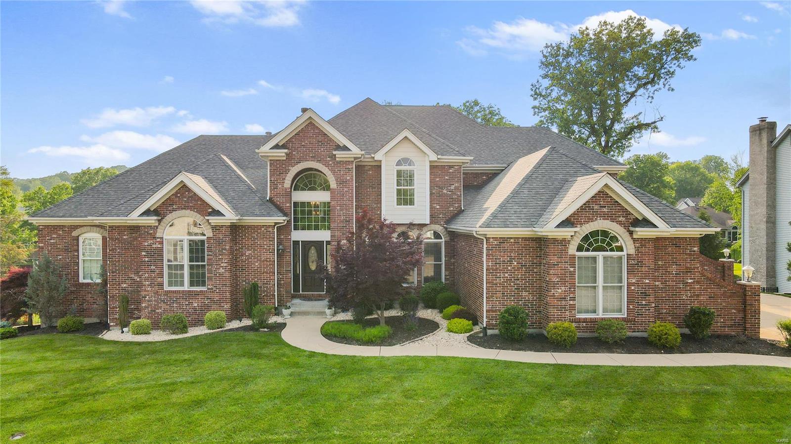Absolutely spectacular, custom 1.5 story situated on a quiet cul-de-sac with a beautiful inground pool and extensive landscaping, deck, covered patio, and 4-car garage. As you enter the 2-story foyer you will find a generously sized dining room, and a large study with built-ins. The 2 story great room features a stone fireplace, walk-behind wet bar, and custom millwork. The updated gourmet kitchen boasts custom cabinetry, granite countertops, a custom center island, breakfast bar, tile floors and opens to the breakfast and hearth room with a fireplace and bay window. The spacious ML master suite, with built-ins and 2 walk-in closets, adjoins an updated luxury bath with a large walk-in shower with dual heads and a whirlpool tub. 3 additional bedrooms, a full bath, and Jack & Jill bath, can be found on the UL. The finished walk-out LL features a theater area, game room, a walk -behind wet bar, hobby/exercise room, bedroom, and full bath. Numerous custom amenities throughout! Additional Rooms: Mud Room