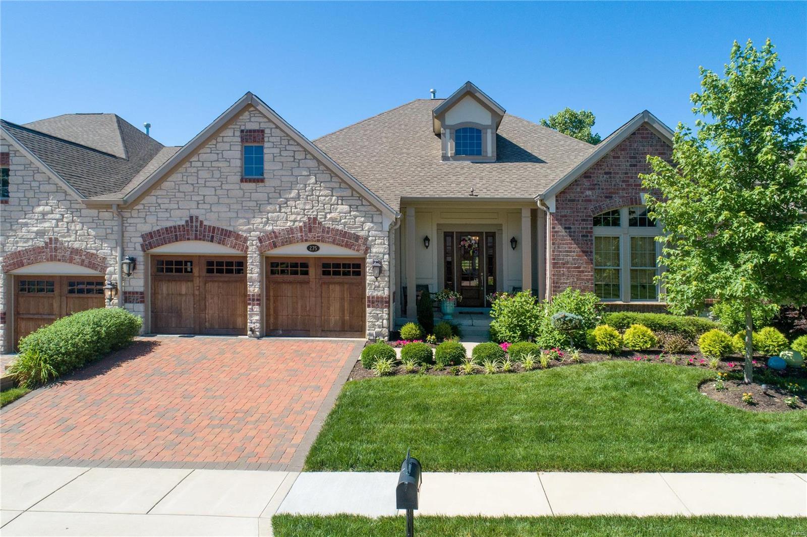 Fabulous Luxury Ranch Villa In Meadowbrook CC! Beautifully designed open floor plan w/3 large Bdrms, 3-1/2 baths & oversized 2 car garage. Custom Work abound in this gorgeous interior. Lots of natural light, Wood floors on main level, Custom Lighting thruout, 3 frplcs, stunning Kitchen w/large center island, granite countertops, marble bcksplsh & high end applcs. BR opens to an enclosed porch w/ frplc which leads to deck & beautiful patio overlooking the lake. GR has frplc & built in bookcases. For more formal entertainment there is a large DR. Mstr ste includes a large walk-in closet & luxury bathroom. 2nd bdrm has its own bath. Main floor laundry. The LL includes high ceilings, natural light, frplc & bonus room off the living area. Wine lovers rejoice! This home has its own custom climate controlled wine cellar! 3rd bedroom is also downstairs with 3rd full bath. Zoned HVAC, inground sprinklers & planter sprinklers as well as many other custom upgrades! Additional Rooms: Sun Room