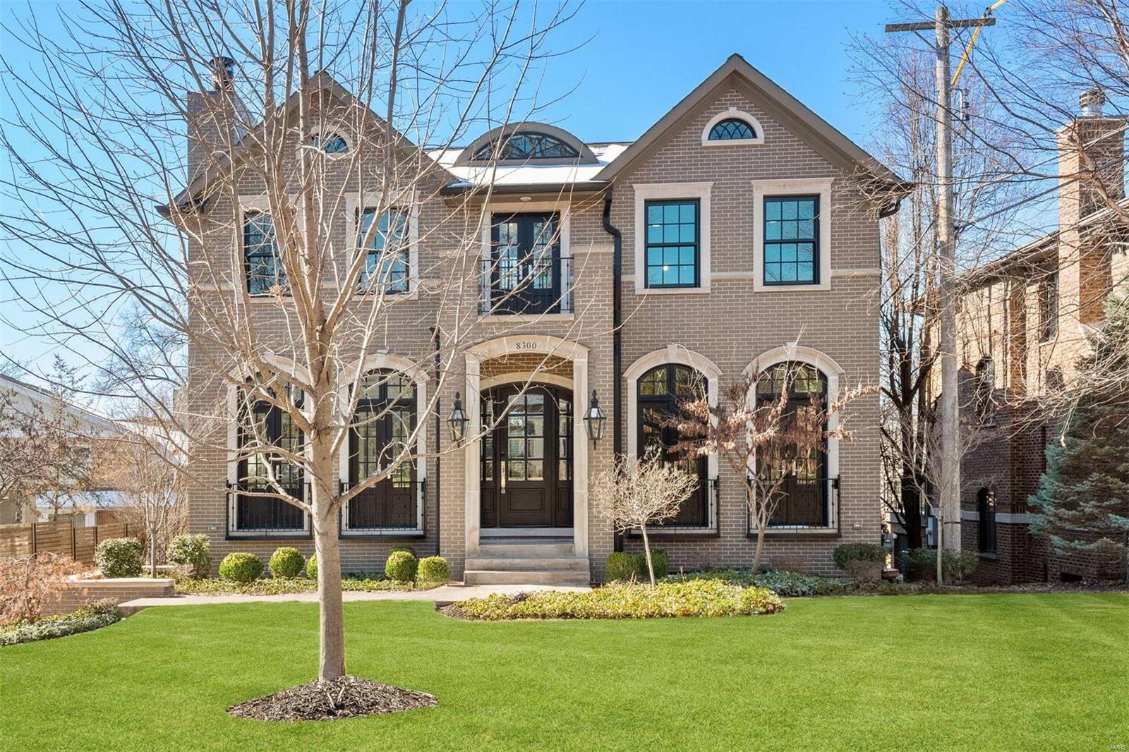 Fall in love w/the elegant home located at 8300 Kingsbury. This luxurious property w/10-foot ceilings, French doors, and large windows allows natural light to flood the surroundings.  Discover a gorgeous dining area & a contemporary office space w/newly added floor-to-ceiling stone fireplace. Experience the modern kitchen features a stone island, new Crystello quartzite backsplash, Wolf gas range, SubZero fridge, 2 beverage fridges, and a walk-in pantry. The hearth room, w/a new stone floor-to-ceiling wall surrounding the fireplace, creates a sleek focal point. The 2nd floor has a large primary suite w/a walk-in closet, a bathroom w/a soaking tub, & a walk-in shower. Indulge in the opulence of a regal dressing room w/ the newly renovated en-suite bedroom. Additionally, this lavish home boasts two other en-suite bedrooms, an elevator, and a finished lower level.  The ultimate location w/unbeatable proximity to highways, Shaw Park, and Downtown Clayton. Live in luxury @ 8300 Kingsbury. Additional Rooms: Mud Room