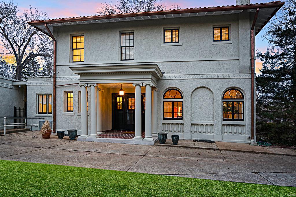 A VISION OF ELEGANCE. Italian Renaissance beauty sits on a magnificent .5-acre lot w/ sensational curb appeal in one of Clayton’s most prestigious neighborhoods. An abundance of space & light thru the enchanting 5 bed/4.5 bath home. Expansive LR w/ wall of arched windows & marble fireplace is perfect for generous crowds. Cozy family room is an informal retreat ideal for intimate gatherings. Timeless kitchen to rouse your inner chef w/ butler’s pantry & bkfst bar. Center hall DR w/ French Doors opens to well-positioned veranda for cheerful gatherings & entertaining. Breathtaking fanned staircase welcomes you to the 2nd floor. Refresh in a marvelous Master Bedroom Suite boasting walk-in closet & updated, spacious bath w/ double granite vanity, soaking tub & separate shower. 3rd floor offers a private hide-a-way. LL Rec Room with full bath invites unltd possibility w/ addtl space. Located in Blue Ribbon Captain Elementary attendance area. Easy walk to Clayton, WashU & Forest Park. Additional Rooms: Mud Room
