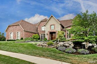 Magnificent 1.5 Sty Estate home on 1.4 acre grounds! Situated in a gated enclave of custom-built homes. Grand 2-sty foyer leads to paneled library with 12’ ceiling, bay window & built-in bookcases, coffered dining room with elaborate molding & butler’s pantry and spectacular great room with fireplace and wall of windows with private wooded views. State-of-the-art kitchen with cherry cabinetry, granite counters, Dacor appliances & center island adjoins sunny breakfast room & hearth room highlighted by stone fireplace. Sumptuous MBR with coffered ceiling, fireplace, bay window & luxury bath with Jacuzzi. The 2nd floor includes 3 large BR’s, 1 with private bath & 2 with Jack n’ Jill bath, + bonus room with custom built-ins. Walk-out LL with family room with fireplace, rec room, 2nd kitchen, wine room, exercise room and bath with spa & 2nd laundry. Gorgeous grounds include pond with fountain, veranda, 3-season room, patio with fireplace, infinity pool, hot tub, playground & 4-car garage. Additional Rooms: Sun Room