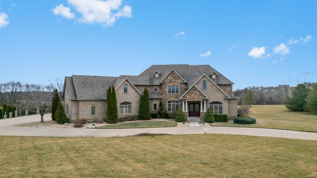 Impeccable estate with EVERYTHING you can need or dream of. Sitting on 5.6 acres in Royal Lake Estates & welcomed with a grand entrance with stunning curved staircase, brand new flooring, roaring coffered ceilings, crown moldings & custom features at every turn. Exquisite yet cozy at the same time. Main level master w/expansive bath & closet with a dreamy dressing room island w/built ins. Kitchen is perfect for small meals or big gatherings with newly added oversized island, breakfast bar, walk in pantry, high end appliances. 2nd floor bedrooms have attached baths and a giant bonus tv/game area perfect for kid & friend hangouts. Entertainers dream in the basement, w/family room, billiard area, home gym, full kitchen has sub zero wine chiller and commercial fridge. Walk straight out to the 20x40 pool w/sundeck, full outdoor kitchen & outdoor pool bath.You wont believe the 60x80 heated/cooled shop-its spotless! W/new kitchen, lofted area, & bath, private full concrete drive to the shop. Additional Rooms: Mud Room