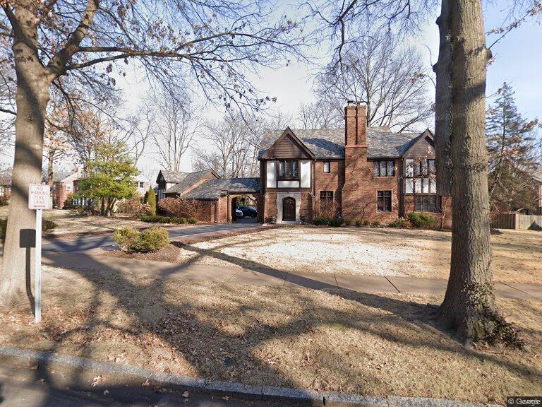 The grand English Tudor-style home described is a blend of traditional charm and modern design elements, offering a spacious living space of 4,000 square feet across three floors. 5 bedrooms, and 4.5 baths. The large "updated" primary suite and the beautifully remodeled eat-in gourmet kitchen are signature rooms. The LL offers a media space, office nook, bar area & full bathroom. The owners have done a fantastic job preserving the home's original 1930s charm while incorporating contemporary design influences. This fusion creates a unique aesthetic that combines the elegance of the past with the comforts and style of the 21st century.  The property's quiet green space allows future buyers to design and create their own pool/hardscape plan, allowing for a relaxing outdoor oasis. 3-car garage attached by a drive-under portico with a rear circular drive in and out to Crestwood Dr.