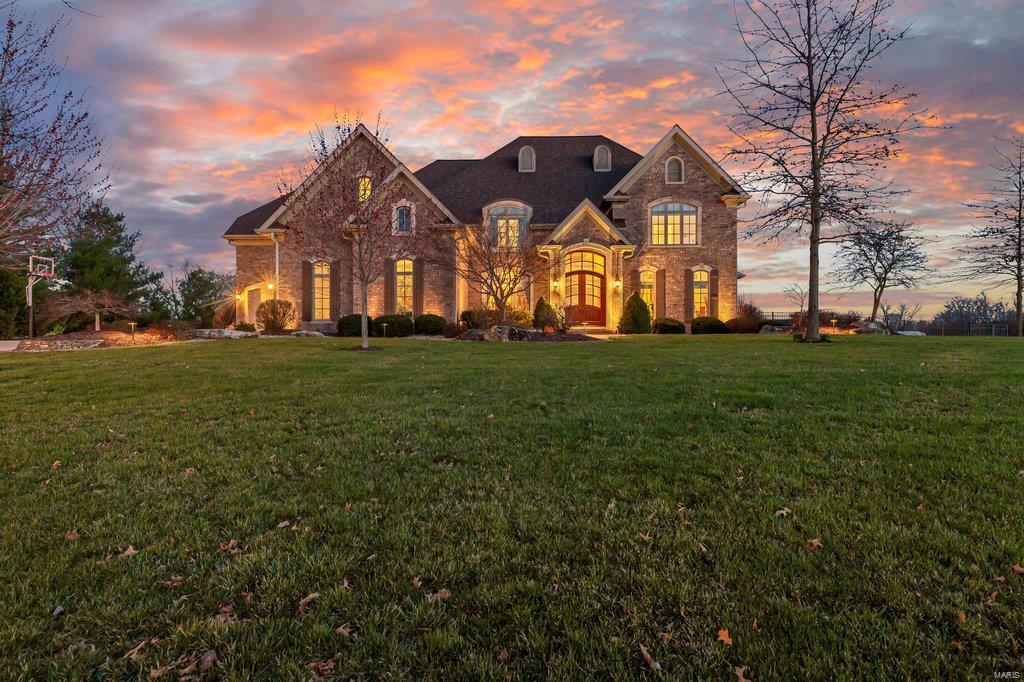 Timeless and Classic Masterpiece. This 5 Bed, 6 Bath custom luxury home on lakefront is a one of a kind show stopper w over 8400 sq ft of finished living area. This home is well known for its architecture, location, features, size & beauty. Soaring custom ceilings, custom Palladian windows, magnificent custom kitchen, etc. Stunning entrance foyer w exposed staircase & a wall of windows frames your lake view. Open Floor plan w custom finishes in all directions. The 2 story great room that opens to the gourmet kitchen promises to be the heart of the home and the cozy hearth room will be perfect for quiet evenings. The walkout basement w/2nd kitchen & rec area is built to entertain, and you are steps away from your inground pool, sand volleyball pit & lake views. Head up to your private oasis the posh master has spa like en-suite featuring dual entry custom shower & spa tub & a walk in closet big enough for a small car. Private ante-chamber w/fireplace gives new meaning to escape & relax Additional Rooms: Mud Room