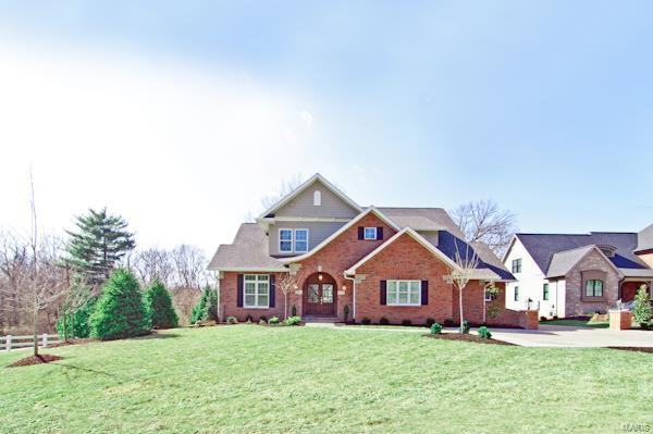 Spectacular NEW home in Ladue just off  Litzsinger, Private lane(4 new homes either built or soon to be built), walk to Tilles Park.  4800+sf  of total living area featuring the finest in details. Spacious open flow employs unique curvilinear design   Light streams in thru large transom-topped windows. Hand scraped finished-in-place hickory floors unify 1st FL. Large foyer by den leads past coffered ceilinged formal dining to family/kitchen w/terrace access. Floor-to-ceiling tiled gas FP surround w/60” TV. Breakfast bar center-island kitchen w/granite, 5-burner cooktop, Wolff/sub-zero appl, cherry custom cabinets. Butler’s pantry & 1st floor laundry.  Main floor master suite with 2 lg  walk-in closets, ensuite bath: steam shwr, soaker tub, heated floors.  2nd floor includes  3BR, 2BA (1 Jack N Jill) addl laundry rm  LL:   5th BR, full BA,  family rm w/wet bar, lots of storage. Fine details, quality finishes thruout. Smart tech. Dual zoned. Lg mud rm, 2 car garage plus 2 car parking pad Additional Rooms: Mud Room