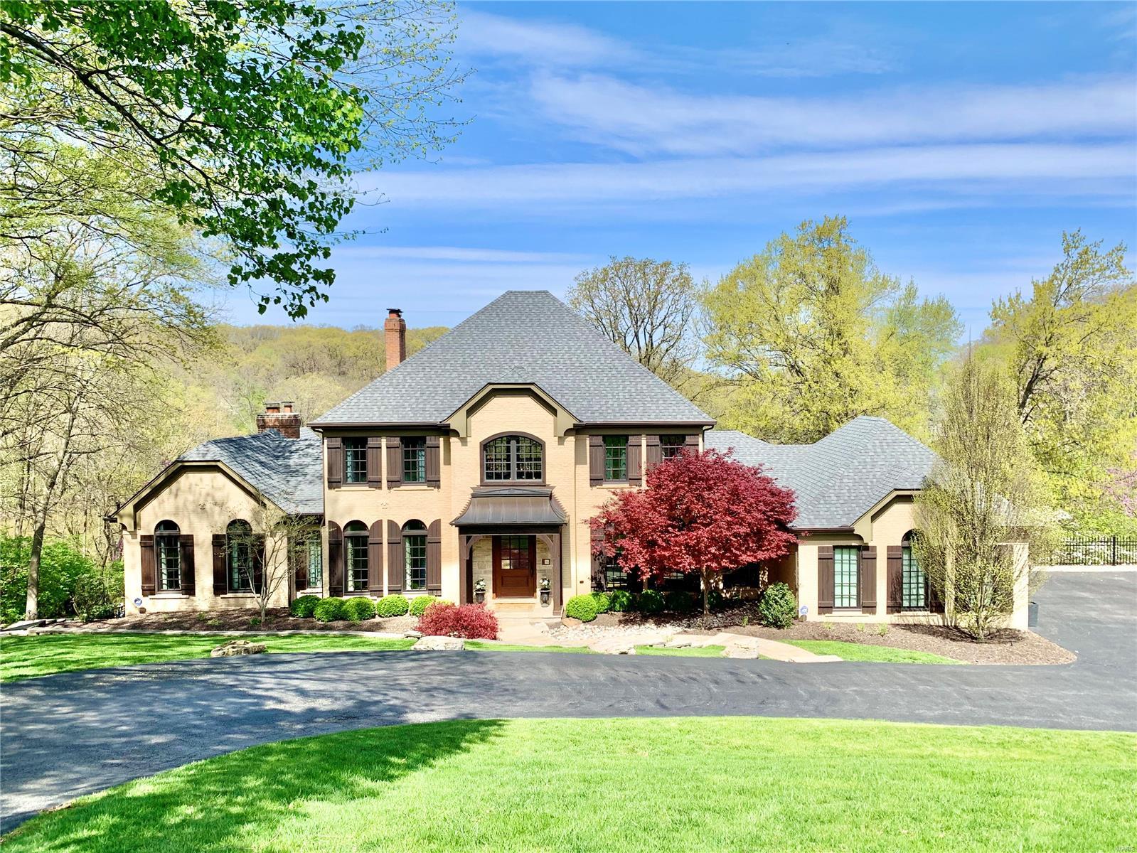 Rare opportunity in the sought after Chesterfield Lakes subdivision. This amazing home features an amazing view/access to lake, over 5100 sq ft of living space, great room w/18 ft ceilings fireplace & an unbelievable view of the lake. Gorgeous hardwood floors throughout the main level & heated tile floors in the kitchen & master bath. The newly remodeled LL is perfect for entertaining w/fireplace, wet bar, wine cellar, & a full bath that also leads out to the pool deck & pool overlooking the lake. Main floor master has a walk in closet & mstr bath ensuite w/soaking tub & walk in shower. The designer kitchen features exposed nat. stone, wood beam,
sub zero fridge/freezer, Wolf stove, pot filler, custom cabinetry, granite countertops, 11 ft island w/farmers sink & addtl prep sink. Newer arch. roof & new Anderson windows. Located in the nationally top rated Marquette HIgh School, snow removal of roads & driveways, 2 lakes, tennis courts are all incl. in this tranquil home! Additional Rooms: Mud Room, Wine Cellar