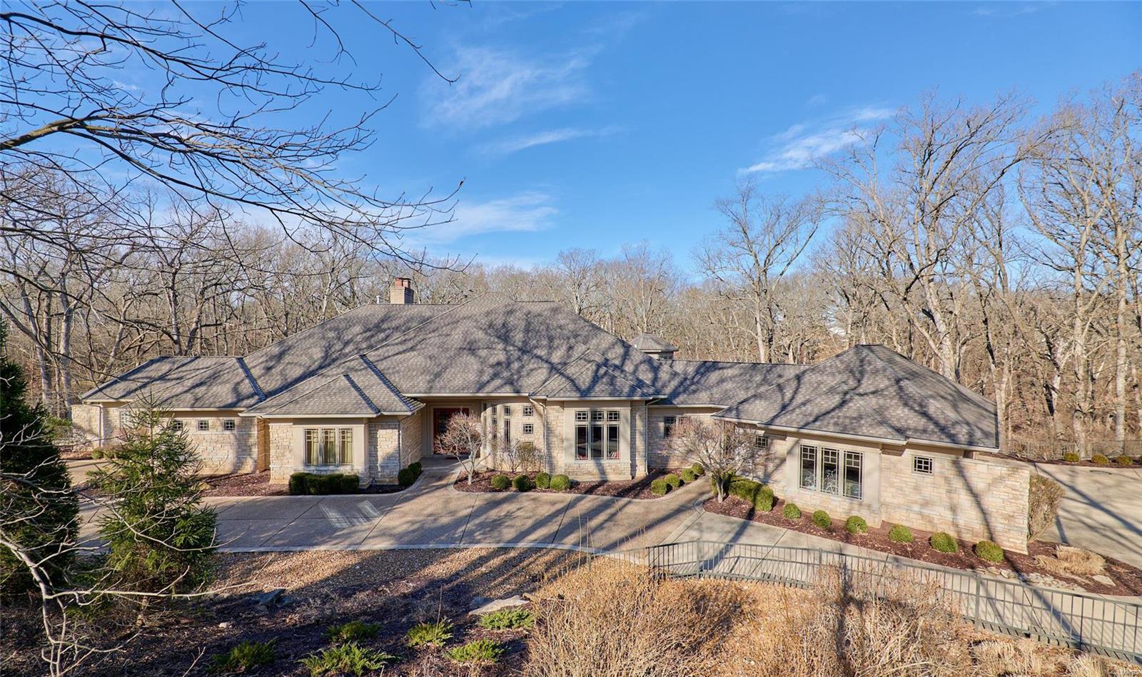 MAGNIFICENT, MAJESTIC AND ARCHITECTURALLY AMAZING SPRAWLING RANCH FEATURING OVER 8,000 SQUARE FEET OF INCREDIBLE CRAFTSMANSHIP! Original Cost Of Property 2.7 Mil! Every Room And Detail Of This Home Was Thoroughly Thought Out.
Quality Materials Surround All Aspects From 11' Foundation Pour, Full Brick/Stone Exterior, Five Zones HVAC, PUBLIC/SEWER/Water, Upgraded Maple Used On Flooring, Handcrafted Columns and Ceilings, Solid Core Doors, Bull-Nose Edge Drywall, Slate Flooring, Ceiling Variations From Vaults, Coffers, Trays and Octagons. Beautiful Master Bedroom and Bath With Heated Floor, Two Handcrafted Stair Systems Plus Elevator and Back Staircase Lead To Lower Level. Dream Kitchen With Dbl Ovens And Warming Drawers, Artistic Workable Center Island With Glass Top, Long gated Serving/Butler's Bar, Lower Level Suitable For In-law Suite/Guests With Kitchenette, Additional Two Beds/Three Full Baths, Stylish Bar, Wine Cellar, Full Office, Work-out Room. Three Acres And Lake Access Comm. Some Accessible Features Additional Rooms: Wine Cellar