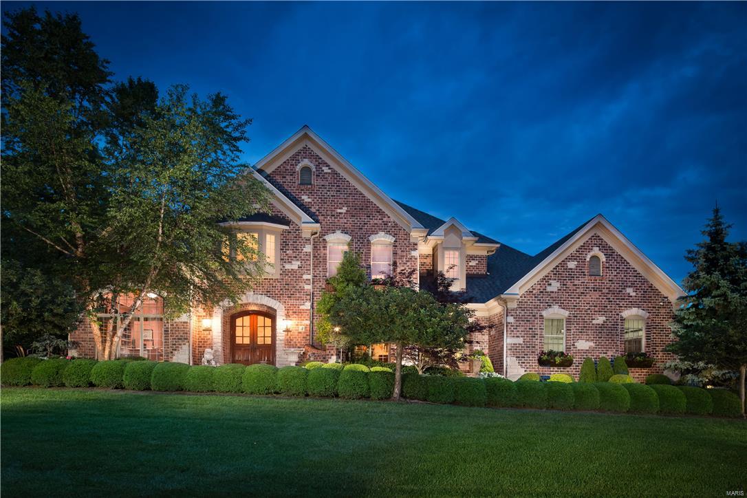 Welcome to this 1.5 story executive home in Ladue Schools with grand foyer, custom details and fresh décor. An architectural masterpiece w perfection thru-out. Foyer has curved stairway opens to great rm,flanked by large windows,beautiful fireplace and bar area.Outstanding kit w custom cabinetry, bkfst room,center island & vaulted hearth rm opens to deck overlooking private in-ground salt water pool & hottub + fabulous pool house w outdoor shower & extensive lush landscaping. Luxurious mainfloor master suite w bay and custom bath.Formal dining room,paneled library with builtins,butlers pantry, main floor laundry and sunroom complete the first level.Second floor with 3 generously sized en-suite bedrms & w/iclosets. The professionally finished expansive LL  is a must see. Large family room with gas fireplace and lovely picture window overlooks pool plus a full bath, game rm, & theatre complete the lower level. Ideal for entertaining.Gorgeous paver driveway and walkways. PRICED TO SELL!! Additional Rooms: Sun Room