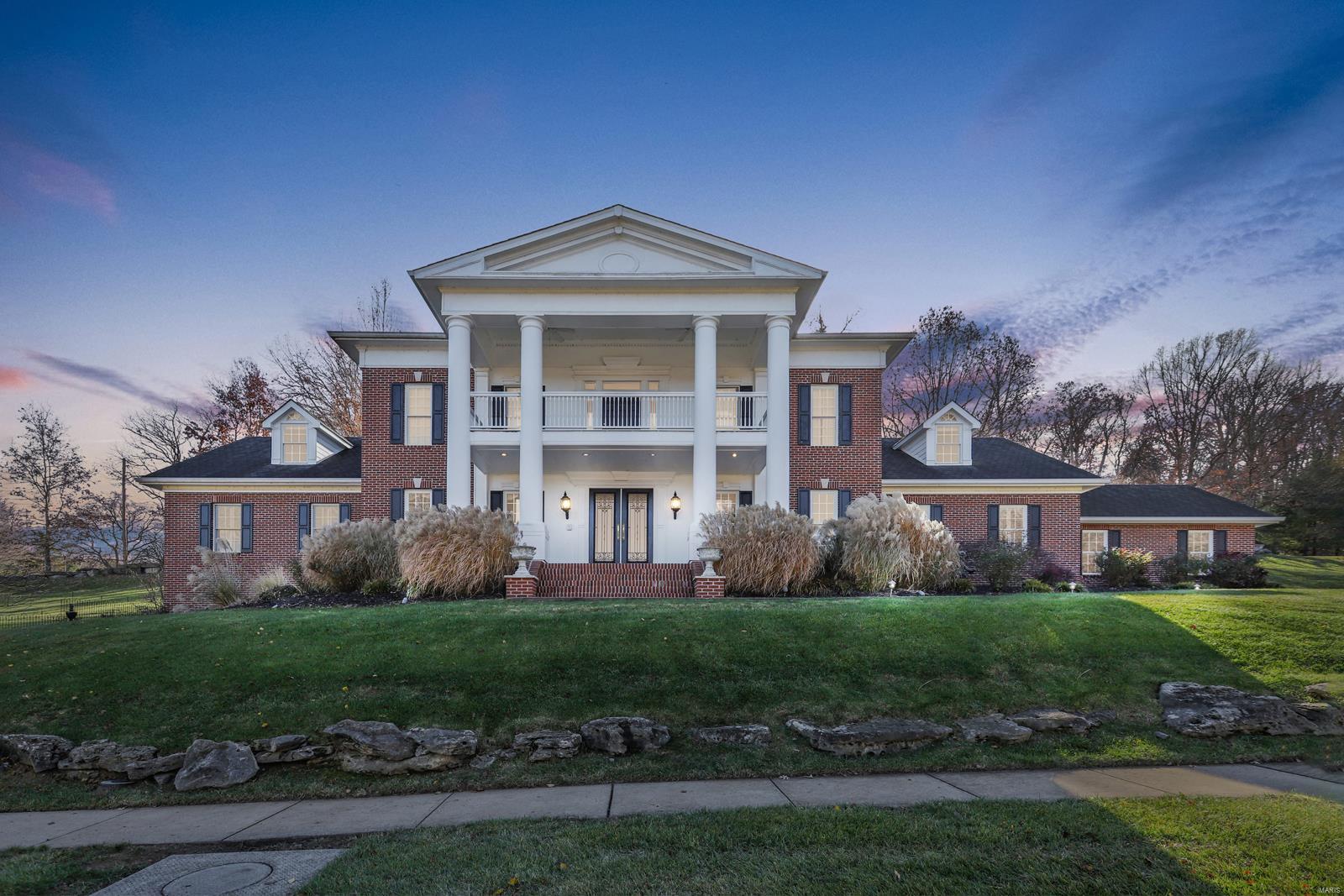 Spectacular, custom built, 1.5-Story home, situated on a beautiful .75 acre, in the prestigious Summerset Parc subd. 4 Bed/5.5 Bath home, has a fantastic open floor plan w/ 8100+ sqft of living space, & stunning, hand-crafted moldings throughout! Gourmet eat-in Kitchen is a chef’s dream, w/ custom cabinetry & backsplash, granite countertops, marble floors, large center island/breakfast bar, top of the line appliances, large walk-in pantry, & an adjoining Breakfast Room. Main Floor Master Retreat with gas fireplace, a huge, custom organized walk-in closet, a dressing room leading to the luxurious Master Bath, w/ dual vanities, a soaking tub surrounded by columns, & separate walk-in shower. Relax outside in your private backyard oasis w/ in-ground pool, with stone pool deck & waterfall feature, sit around the custom stone fireplace, with built-in grilling station, the side paver patio off the Lower Level, or on the large covered front porch.