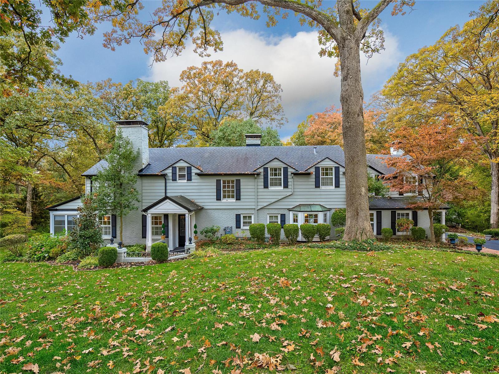 Great opportunity to live on one of Ladue's most attractive lanes.  This is a classic 3,800 square foot family home with plenty of space for continued expansion on a picturesque 1.5 acre private wooded lot.  Wonderful entertainment flow inside & out, large patio with adjoining pool and poolhouse in a wooded, park-like setting.  4 spacious bedrooms upstairs with additional office/nursery area. Separate 3-car garage with full 2nd floor attic storage and large tool & garden shed.  Don't miss this fabulous home by renown architect Beverly Nelson!