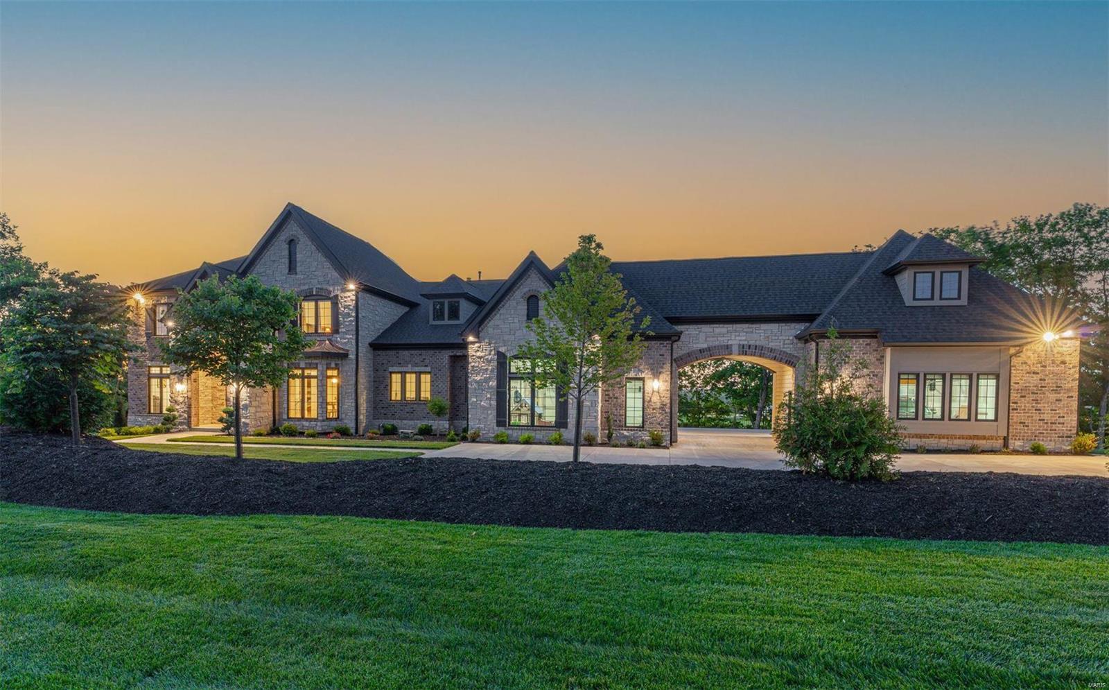 Exceptional new construction opportunity w/ up to 6500+ sq ft of pure indulgence, offering 4 beds (5 or 6 bed layout offered) & 3 1/2 baths. Prepare to be enchanted by the high-end finishes throughout, showcasing exquisite craftsmanship and impeccable attention to detail. The luxurious main floor primary suite is a haven of tranquility, while the amazing kitchen w/ a beautiful hearth room is perfect for culinary delights and intimate gatherings, and all of the other common spaces exude an inviting yet sophisticated feel. The optional lower level finish is a true entertainment oasis, featuring an amazing theater room, well-appointed bar, and a recreational space that seamlessly connects to the outdoor hearth room. Situated on over an acre of land, this property offers captivating views that will leave you in awe. With a 4-car garage, with distinguished porte-cochere. Located on one of Chesterfield's most coveted streets, the address alone exudes exclusivity and prestige.