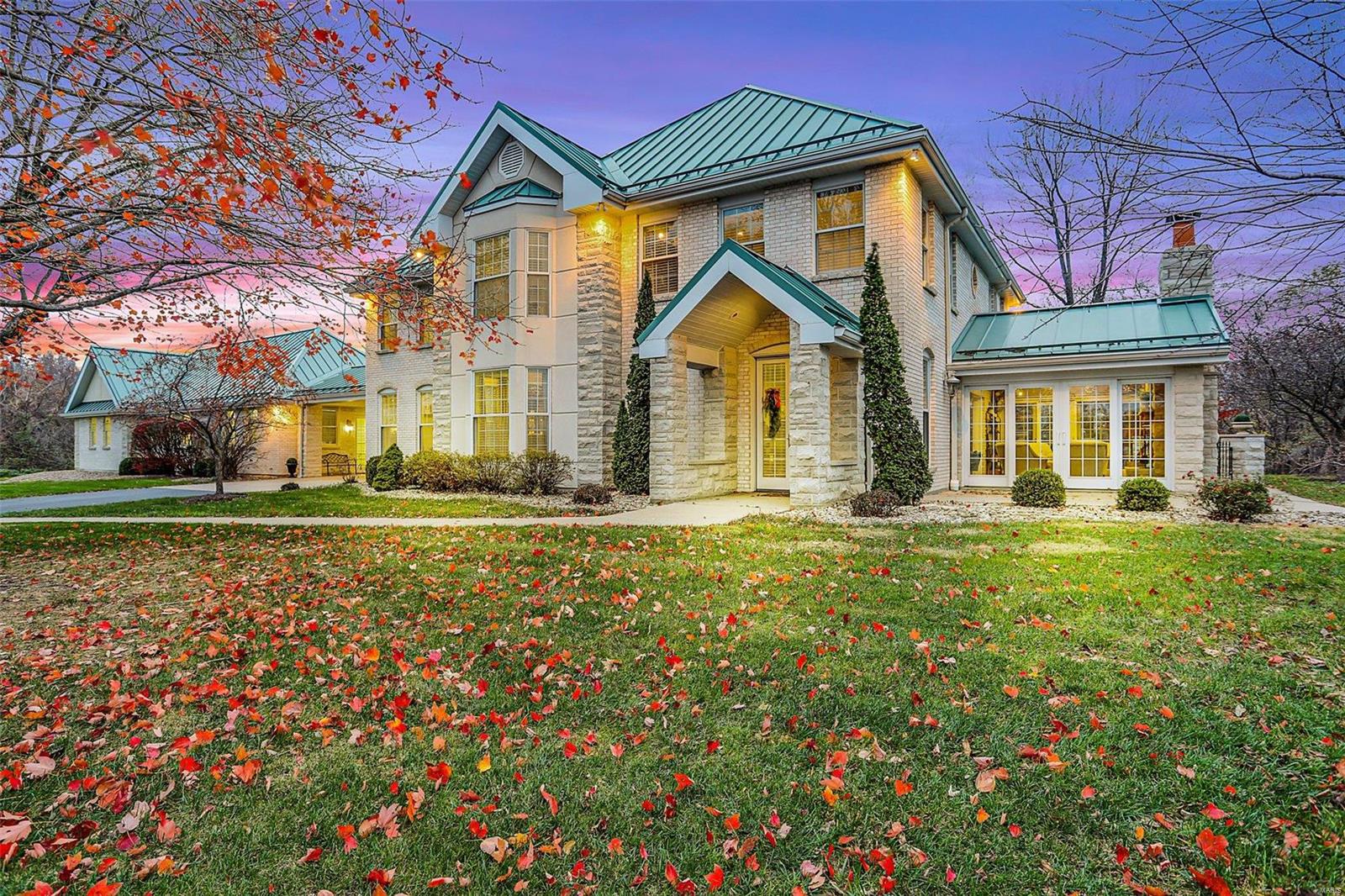 Prepare to be amazed by this stunning custom-built home, offering a blend of modern luxury, thoughtful design & serene living. Situated on a gorgeous 4.7-ac lot in the sought-after Wilkinson Place, this property has it all! Spacious open floor plan perfect for entertaining. Recently updated gourmet kitchen & spa-like bathrooms. Luxurious primary suite w/ own private balcony designed for comfort & privacy. Addl 2 bedrooms & 2 baths on 2nd floor. Flexible layout w/ potential for a mother-in-law suite/extra bedrooms. An incredible 6-car heated garage/workshop for all your hobbies & storage needs. Step outside to your very own outdoor retreat! Beautifully designed patio spaces are perfect for entertaining, relaxing or simply enjoying the outdoors. Historic carriage house is ready for your own personal touch. This home offers the tranquility of country living while being just minutes from city conveniences. Looking for room to grow, entertain or relax, this property is the perfect match!