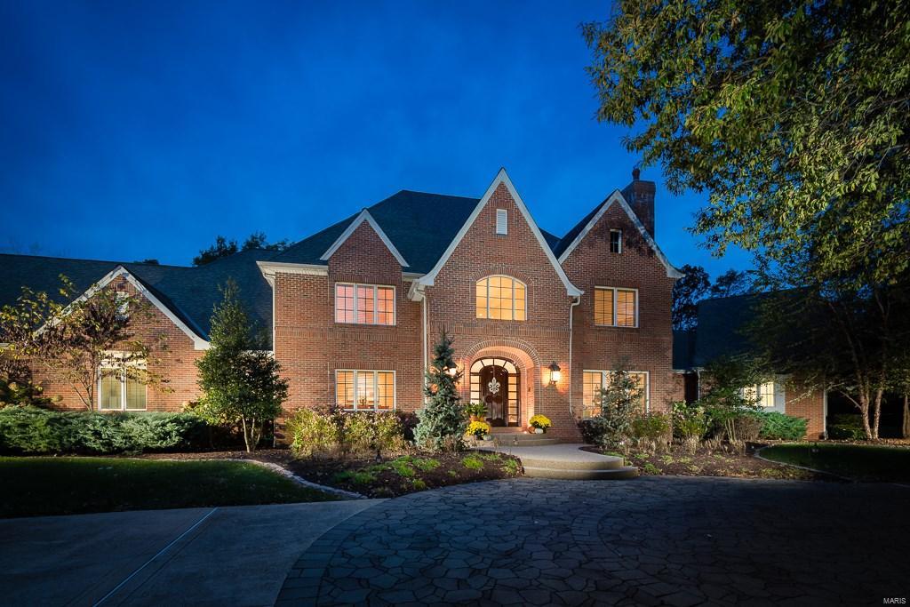 Like New!  This exceptionally designed residence allows for comfortable  living and  entertaining. Nestled on over 3 acres on a private cul de sac.  Very open/bright/ and inviting home.   Center of home features well designed wet bar area plus butlers pantry ideal for entertaining!  Great kitchen opens to hearth rm and large Veranda.  Magnificent master suite on main with custom bath/steam shower and soaking tub, great closets and laundry area!  4 ensuite bedrooms on second.   Main floor also boasts a 15x14 homework/craft rm could be a 6th bdrm suite.  2 coat closets/locker rm and a laundry room!  Prof fin LL with rec room / family room area / exercise room and full bath!  Tons of storage.  This is quite possibly the prettiest lot in prestigious Huntleigh Woods.