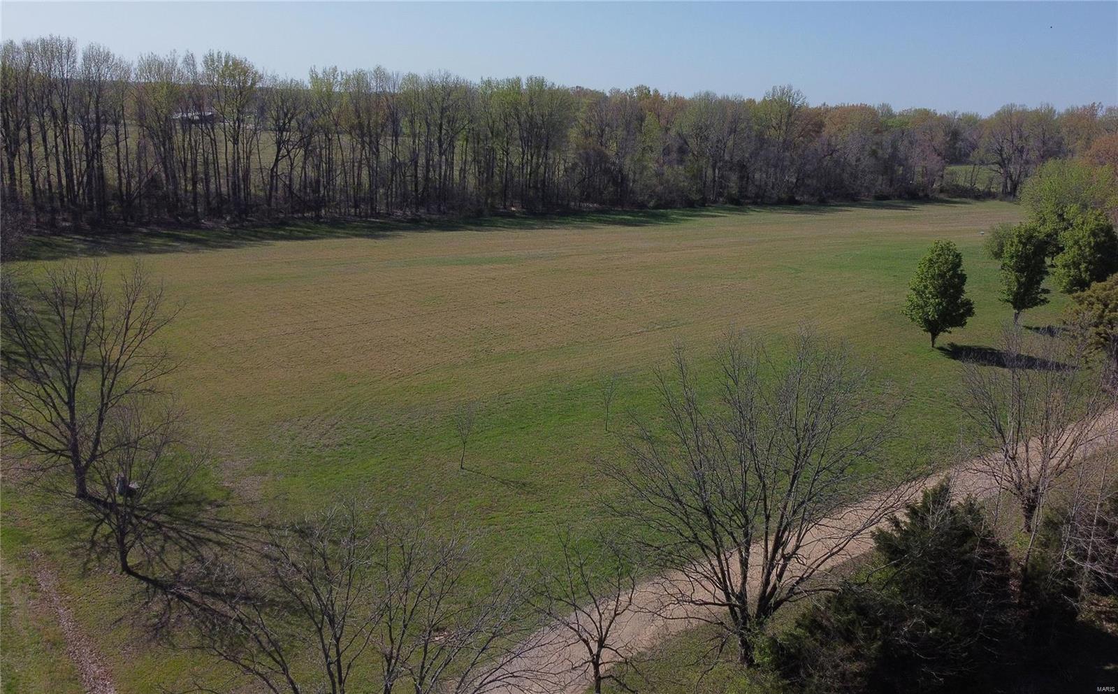 Ready to start building your dream home? 
Escape the city limits!! 1.2 acres of cleared land awaits - a blank canvas for a country-inspired dream home in Dexter, across from Northwest Oaks Subdivision. 
*(1.2) acre lot for sale, or option to combine into larger acreage option, up to 5.3 acres. 
*Acreage surrounded by trees and a creek
*Private road
*County taxes 
*Restrictions apply