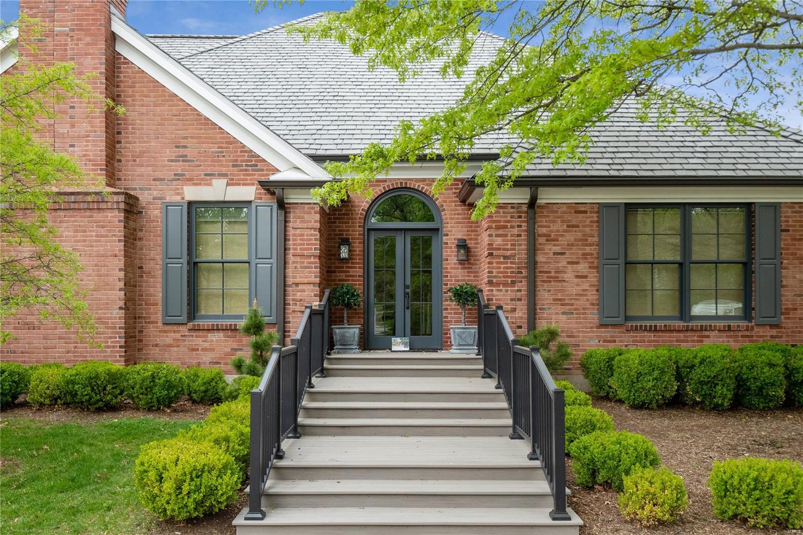 This gracious home in the desirable Haverford Terrace neighborhood has recently been
completely transformed including a total kitchen renovation. All of these enhancements are new: outdoor living space, landscaping, roof, generator, A/C, windows, interior & exterior doors. The large and bright living room features a gas fireplace & custom millwork with French doors leading to a private patio. The formal dining room has a large picture window & can handle entertaining in a grand way. The expansive, main floor bedroom boasts a bay window, very spacious walk-in closet & a luxurious bathroom. The kitchen has quartz counters, center island & a breakfast room with doors that lead to a new maintenance free deck. Main floor laundry. Upstairs are 3 large bedrooms and a full bathroom. The lower level has 2,000 sq.ft. of finished space including a living/TV room, recreation room, bedroom, full bath & bonus room. Ladue Schools. 2 car garage w/epoxy floor. Association covers landscaping & streets.