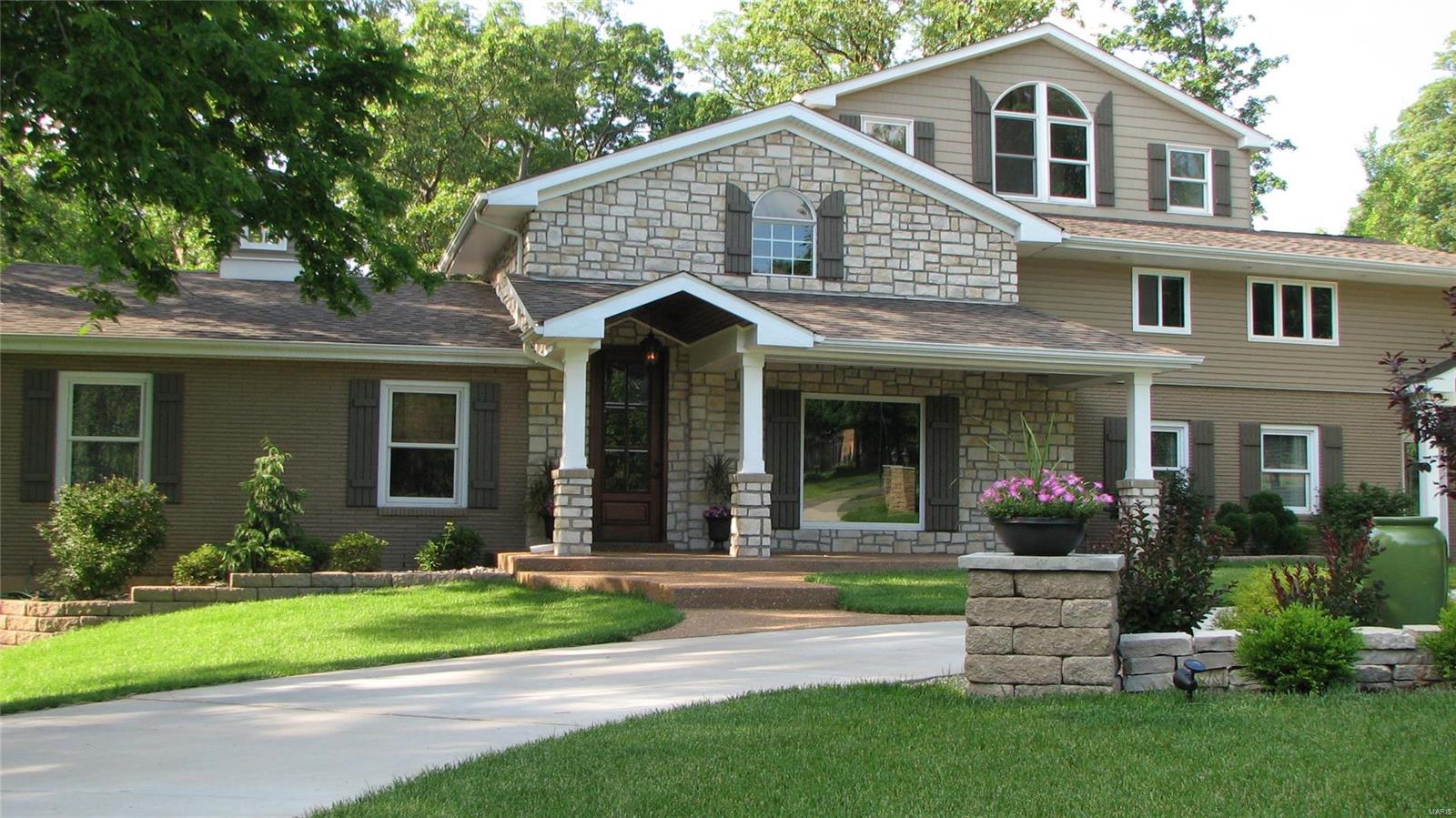 $180k BELOW WRITTEN APPRAISED VALUE! Sprawling gut renovation & new construction on 1-acre wooded lot in the heart of Sunset Hills. Top rated Lindbergh Schools. 6000+ sq ft of new living space loaded w/rustic contemporary charm & great attention to quality & detail. Features include 1st floor master bedroom, his/hers custom closets & private deck. Kitchen has natural stone floors, granite countertops, knotty alder cabinetry, commercial grade appliances, pantry/laundry, center island w/additional sink, & breakfast bar adjoining just completed hearth room w/soaring 12' wood & beamed ceiling which opens to deck. 4 morel spacious en-suite bed/baths; each w/walk-ins. Add'l 2nd fl laundry, loft, & bonus room and/or office. Finished lower level features wet bar & walks out to a pergola covered patio & additional bar for outdoor entertaining. Too many features to mention! This versatile floor plan is sure to appeal to a wide range of discriminating buyers. BE SURE TO CLICK ON VIRTUAL TOUR! Additional Rooms: Mud Room