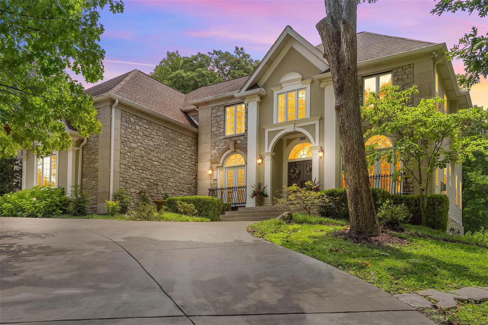 Amazing home on wooded 3Ac Lot. You are welcomed by a 2-sty foyer w/esquisite flooring, custom millwork & archways leading to the Dining & Living Rooms. The Great Room is adorned w/built-ins & fireplace. The Gourmet Kitchen includes custom cabinetry, island featuring a veg sink, granite, professional grade appliances & walk-in pantry flanked by the Hearth/Brkfast rm w/a lovely stone fireplace. Glass enclosed 4-season rm is a sunlit sanctuary. A Study/BDRM w/connecting full bath & Mudroom completes the Main. UL Primary Suite with sitting room & see-through fireplace to luxurious bath w/ steam shower & walk-in closet w/ W&D. 3 add'l BDRMS, a Bonus rm/BDRM, & 2 full baths (1 ensuite/1 J&J) complete the UL. Amazing LL living: Separate entrance, BDRM w/ensuite Bath & sleek high-end full Kitchen + an exercise studio & additional full bath! Beautiful outdoor multi-level patio w/serene lighting & firepit for your enjoyment. New AC units July 2024. So much more, see pictures & descriptions Additional Rooms: Mud Room