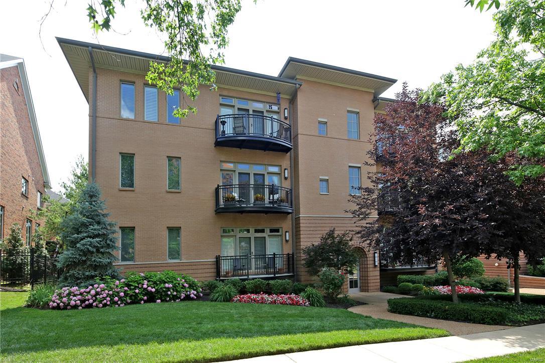 An amazing find a 1.5 story Clayton  penthouse with 3 outdoor living spaces. The main floor features a large living room complete with gas fireplace and built-ins leading to the 1st balcony,  a gracious formal dining, kitchen and breakfast room.  The main floor master suite offers his and her master baths each with it’s own walk-in closet and  a 2nd balcony.  The 2nd floor offers 2 loft areas one area with a wet bar, perfect for a family room and the 2nd area could easily be an office.  Additonally, there are two additional bedrooms with a jack and jill bath.  All leading to an amazing 18x11 rooftop terrace a coveted amenity.  Additional features include 10’ ceiling heights, paneled doors, 2 parking spaces in the garage, and additional storage all in an elevator building.  Located on one of Clayton’s most sought after streets just steps to Shaw Park, restaurants shopping and more.  Truly an exceptional place to call home. Location: Corner Location, End Unit, Upper Level