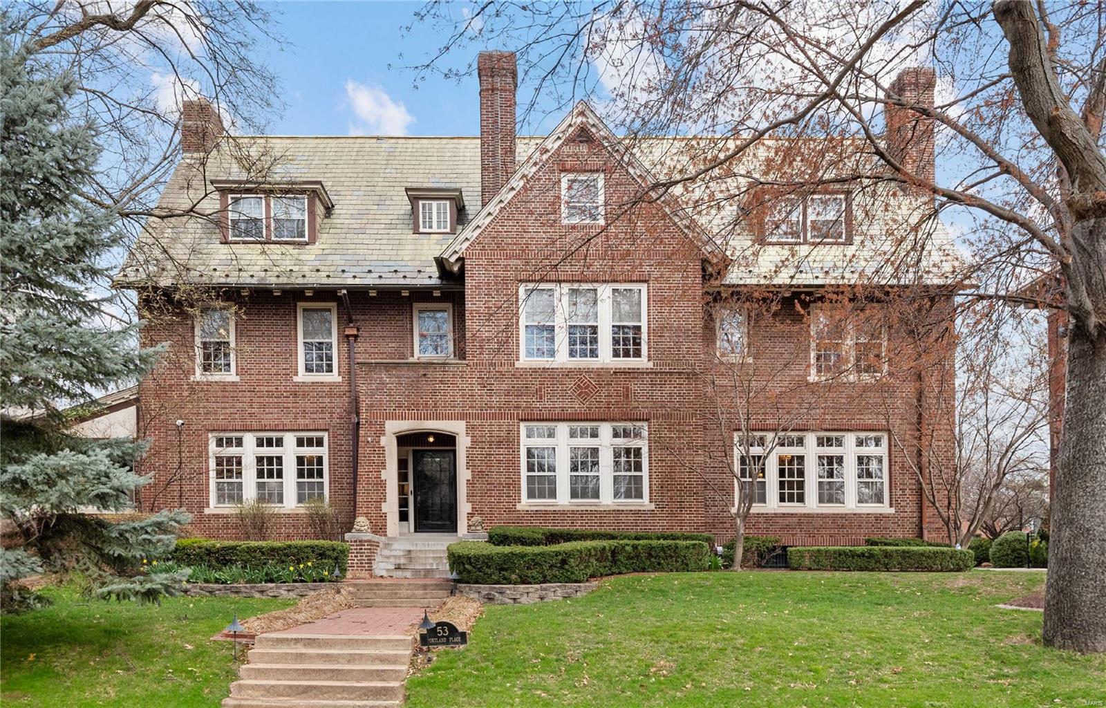 Built in 1912 by Louis LaBeaume (Stifel Theater!), this estate has been meticulously modernized combining contemporary comfort w/ exquisite architectural details of a by-gone era. Living rm boasts hand-crafted paneling and arched built-ins + a light-filled sunroom. Adjoining 3 season room is ideal for relaxing or lively gatherings. Foyer transitions to a versatile home office, a music room, and an elegant dining room adorned with artisan plasterwork. The updated kitchen has a spacious quartz island, Wolf & Sub-Zero appliances, breakfast nook, & sitting area. 2nd flr w/ updated in-law suite complete with a kitchenette & bathroom, dual laundry room, and spacious primary suite with 2 bathrooms and a walk-in closet. 6 total bedrooms could be expanded to 8. 3rd flr media room is pre-wired for entertainment. Sophisticated wine cellar on the lower level. Outdoors find an in-ground pool, outdoor fireplace, patio, & lush gardens, all set within one of the city's most prestigious neighborhoods. Additional Rooms: Wine Cellar