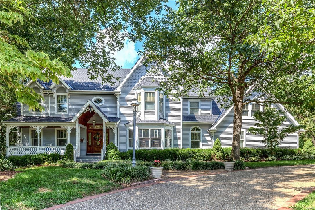 Spacious & light-filled Kirkwood home offers exceptional architectural features and sits on over an acre private wooded lot.  This gracious home features open floor plan w/ 9-foot ceilings, millwork & expansive rooms perfect for entertaining. The circle drive and front porch lead into entry w/ turned staircase & open to living & dining rooms & stunning library/den w/box bay ceiling & built-ins. Family room opens to heart of the home-a gourmet kitchen w/ granite counters, Dacor & Subzero appliances &planning desk in breakfast area. Sunroom w/windows on 3 sides has stunning views & walks out to deck overlooking pool & stone pathways through landscaped yard & built in fire pit. Upstairs the serene master suite has cove ceilings and lg. master bath. Four large bedrooms, office and 2 full baths complete 2nd floor. Walk out lower level continues attention to detail w/fireplace, built-ins, fitness rm & pool bath. 3 car garage, sprinkler system and home warranty. On quiet cul-de-sac street. Additional Rooms: Sun Room