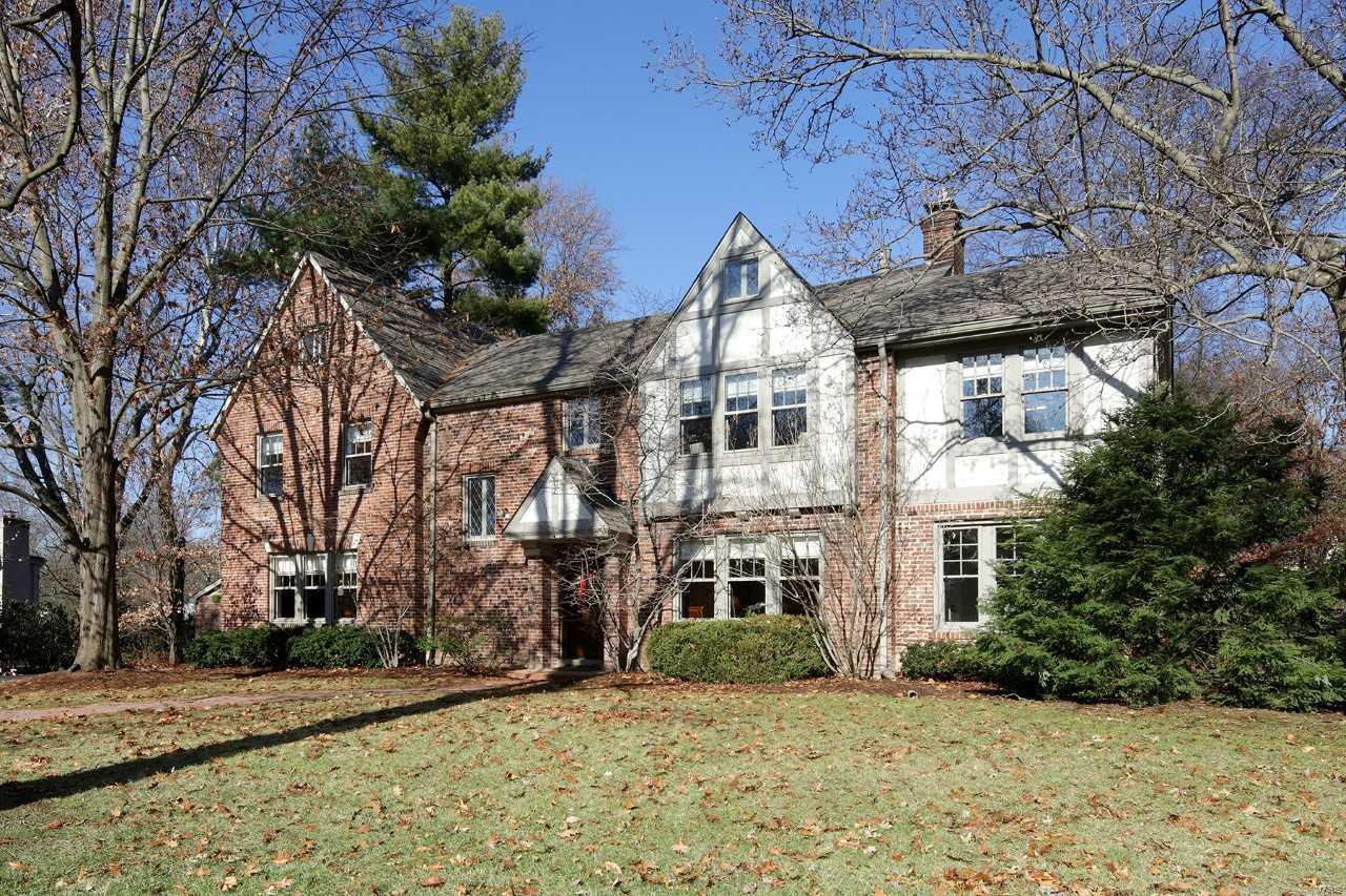 Great new price. Gracious style & timeless charm are hallmarks of this enchanting English tudor, nestled on a private acre in one of Ladue's most coveted lanes. Step into the  beautiful entry foyer introducing exquisite architectural details that include leaded glass windows and gorgeous millwork.  Graciously  appointed living & dining rooms are both elegant & generous in size allowing for formal entertaining. French doors open to a cozy sunroom with a private side patio. Handsome gourmet kitchen features custom cabinetry, stainless steel appliances, eating area, large center island and bar area opening to a charming hearth room with wood burning fireplace. Upstairs is a private master suite with adjacent sitting room. All the bedrooms are generously sized with direct access to a bathroom and abundant closet space. The third floor suite for guests, teens or live in help. Picturesque yard with lush gardens, inground pool and blue slate patio is your private oasis. 3 car garage. Additional Rooms: Sun Room