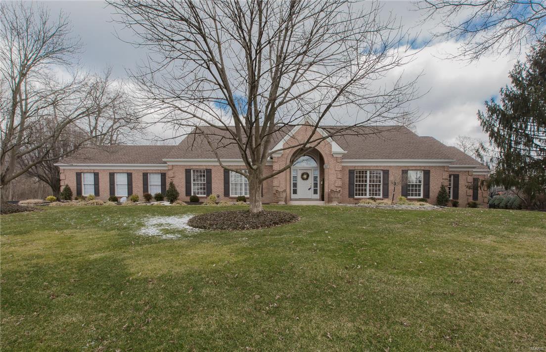 Sunset Hills, Lindberg Schools: Stunning all brick 4000 square foot custom built ranch on a cul de sac street with a huge fenced, level rear yard with heated salt water pool.  Loaded with updates in 2015.  Interior features include granite tiled entry foyer and hallway with arched doorways cased on wood trim.  Wide plank shaved wood floors in the Kitchen, Breakfast room and Family room.  Granite counters and Thermador double ovens.  Main floor laundry. Cathedral beamed ceiling in the Family Room accented with stone, gas fireplace.  Handcrafted beamed ceilings in the master suite are a work of art.  Newly remodeled luxury master bath with His/Her vanity, stand alone jet tub and luxury shower. Walk-in/walk through master closet with custom organizers can be shared with adjoining bedroom.  Newly finished lower level workout room and additional full bath with Sauna.  Covered patio overlooks the pool and professionally landscaped yard.  3 car rear entry garage, zoned HVAC, Home Protec. Plan