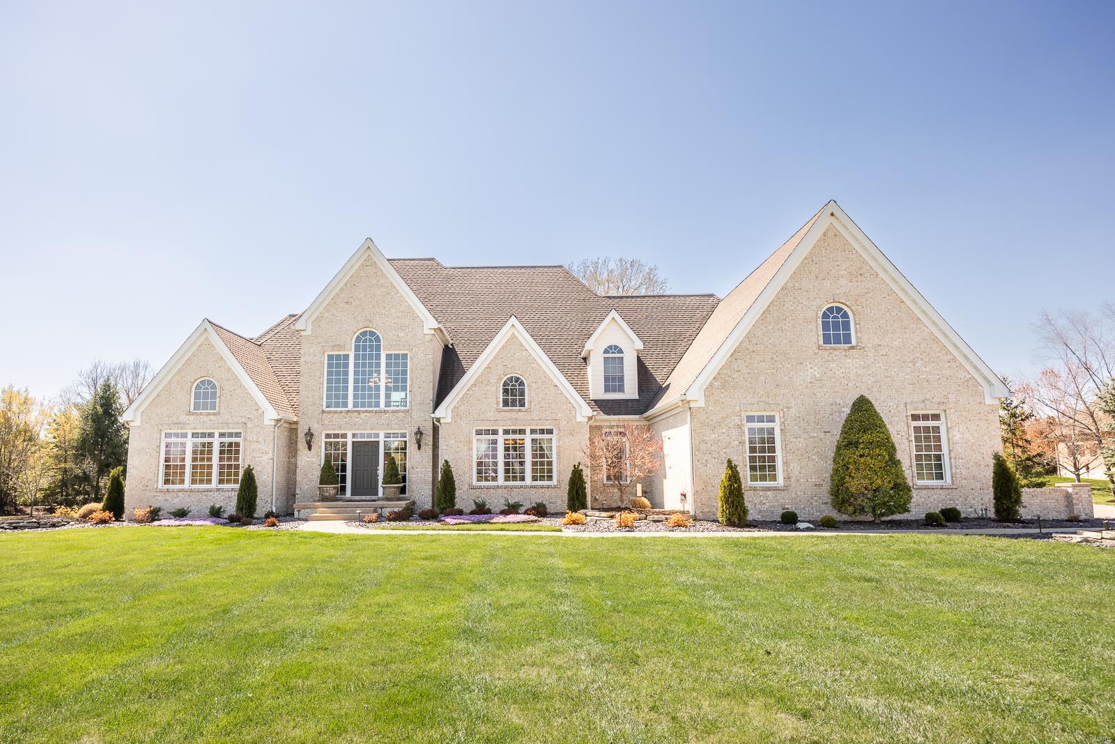 Executive, all-brick home perfectly set upon an almost 2 acre lake lot in the gated community of Waterford Place. Step into the grand foyer which is flooded w/light from the surrounding windows offering breathtaking views of your peace of paradise. Custom-built w/ meticulous attention to detail, updated throughout the one-owner home. The main floor features a den, 1/2 bath, a huge living room w/fireplace. A bright breakfast area opens to the warm hearth area & updated, dream kitchen. A lg office, laundry room & 2nd 1/2 bath. Main floor master is a true bonus. Updated ensuite w/free standing tub is a dream oasis. Upstairs are 2 beds w/Jack N Jill bath and a 2nd Master Suite.  Experience comfort & efficiency w/geothermal. A finished basement w/workout room, rec room, full bath, & kitchenette. 4-car heated garage equipped w ceiling fans & floor drains. There is a paver driveway, patio, & pool area w/pool house w/bath shower & brick fireplace by the pool. Buyer to verify all information. Additional Rooms: Mud Room
