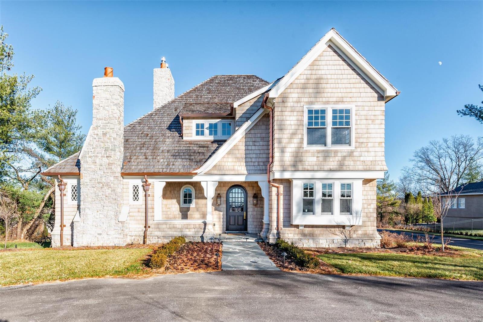 Stunning 6 bedroom, 8 bath spec house by Period Restoration offering over 7,500 sqft of luxury living space.  From the main floor Master Suite to the private Au Pair / In-Law Quarters & lower level whiskey bar, no amenity has been forgotten.  4 En Suite bedrooms on the 2nd floor and an additional bedroom on lower level.  Exquisite trim work and custom fine furniture quality inset cabinetry and hardwood floors throughout. 3 fireplaces, Kohler fixtures & marble clad bathrooms.  Gourmet eat-in kitchen features statuary marble tops and gorgeous oversized center island with butcher block top.  Finished with double Kohler farm sinks & SubZero, Asko and Wolf appliances, this is a true chef's kitchen.  Butler's pantry allows for additional storage, dishwasher, wine cooler, built-in Miele espresso machine and library ladder to access storage.   1 acre lot, 10' ceilings on 1st floor, 9' on the 2nd. The finished lower level offers and additional 2,000+ sqft of exquisite living space. Additional Rooms: Mud Room