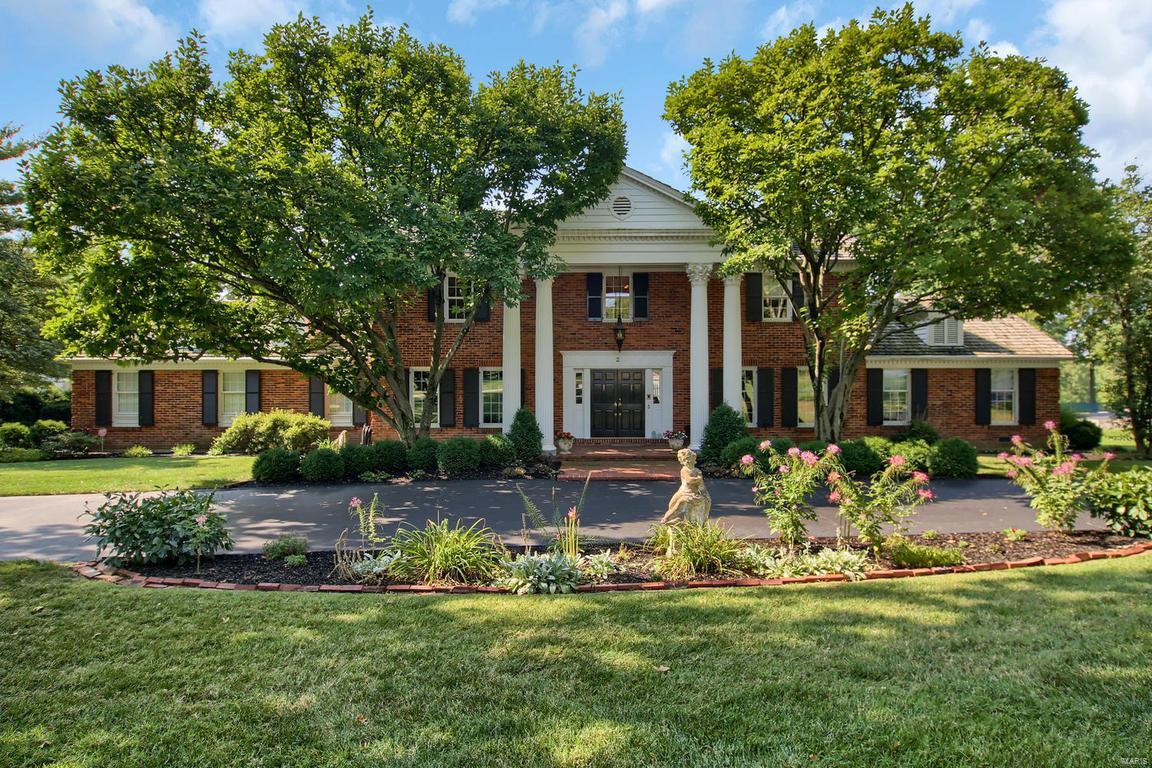 Higginbotham Custom Brick Home Situated on GORGEOUS LOT...1.17 Acre BACKING TO THE 5TH HOLE OF BELLERIVE COUNTRY CLUB GOLF COURSE!!! Approximately 100 Yards from the Green! Great Street Appeal...Circle Drive...3 Car Garage...So Much Space to Enjoy Every Facet of Life! 5000+ Sq Ft of Living Space including Great Lower Level! 5 Bedrooms includes MASTER SUITE ON MAIN LEVEL...6 Baths including LUXURY MASTER BATH...Great Kitchen with Breakfast Room Boasting Picturesque View of Huge Patio,Private Inground Pool, Yard & Golf Course!  Kitchen features: Carerra Marble Floor & Backsplash, Granite Counters, Stainless Appliances, Sub Zero Refrigerator, Electrolux 5 Burner Gas Stove & More...Work at Home in Bright Office Looking Out to Pool & Course...Fantastic Finished Lower Level: HUGE Recreation Room with Awesome Wet Bar, Bath, Game Area, Pool Table Area & Ample Space to Relax and Watch the Game...Additional Lower Level Area for Hobby/Play/Exercise. So Many Great Features! Must See to Appreciate! Additional Rooms: Mud Room