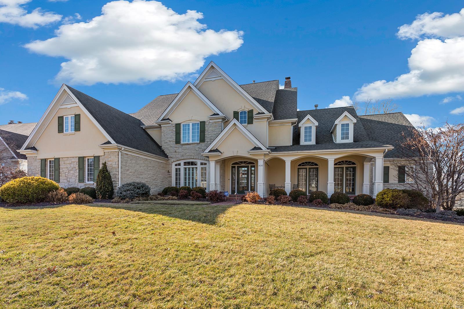 Custom built 1.5-Story on a gorgeous private lot, with exceptional outdoor living featuring a stone gazebo with 2-sided fireplace backing to the lake! 5 Bed/6.5 Bath showplace, with nearly 7,500 sqft of living space! Main Floor boasts: formal Dining Room /crown & chair rail moldings, gorgeous barrel ceiling, Study/Den with custom built-ins! Dramatic Great Room with a 2-Story wall of windows, gas fireplace, custom built-ins & wet bar. Gourmet Kitchen with granite counters & backsplash, 2-tiered breakfast bar & center island & walk-in pantry. Light & airy vaulted Hearth Room with gas fireplace/stone hearth & surround. Main Floor Laundry, Mud Room with custom lockers & Powder Room! Main Floor Master with a large 5-bay window, dual custom closets & luxury Bath. Walkout Lower Level has a large Rec Room, wet bar, fireplace flanked by built-ins, home theatre, fitness room, ballet/dance room, 2 full Baths: steam shower & full size sauna and a huge walk-in cedar closet!